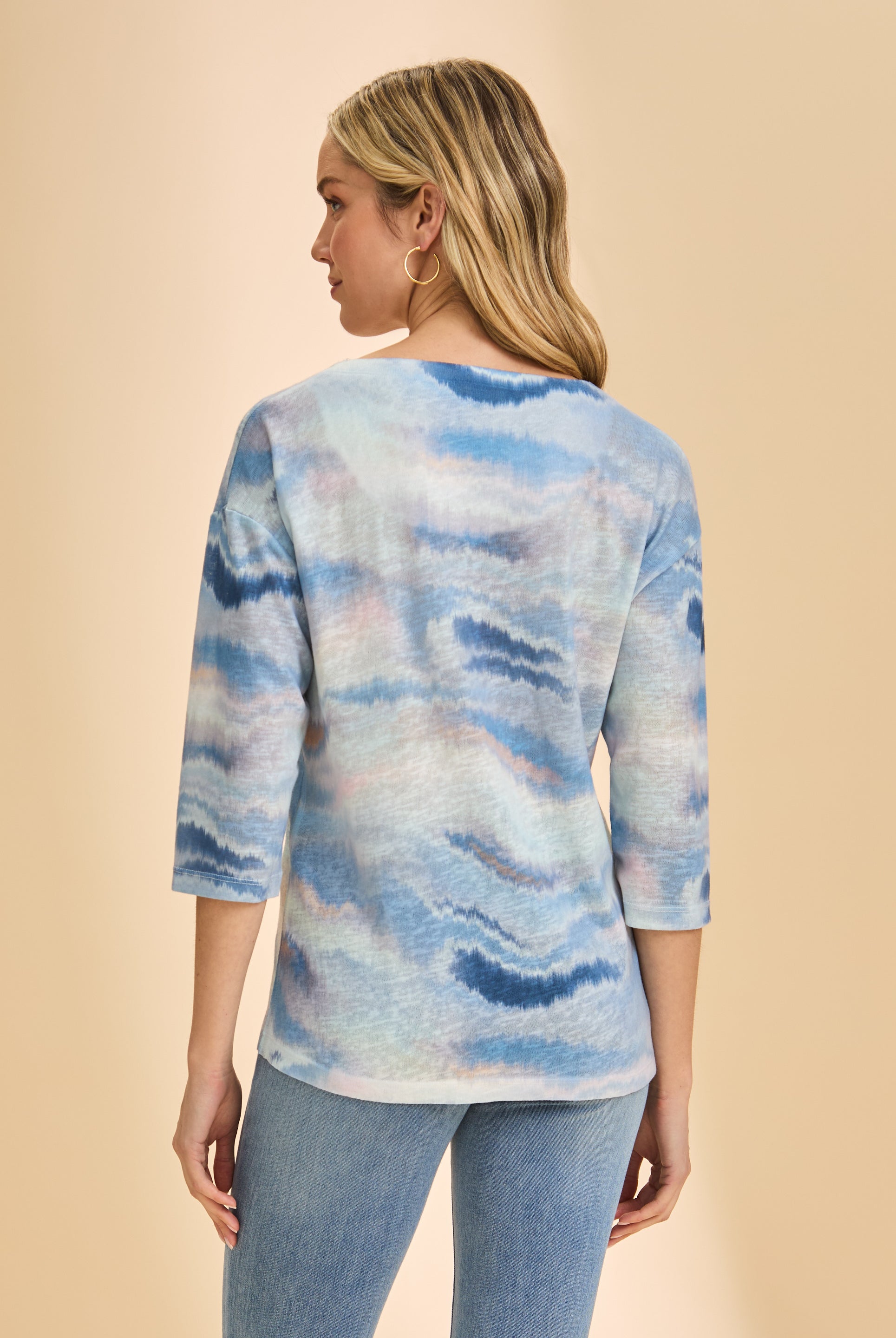 Back view of blue wave pattern on 3/4 sleeve V-neck top by French Dressing Jeans (FDJ)