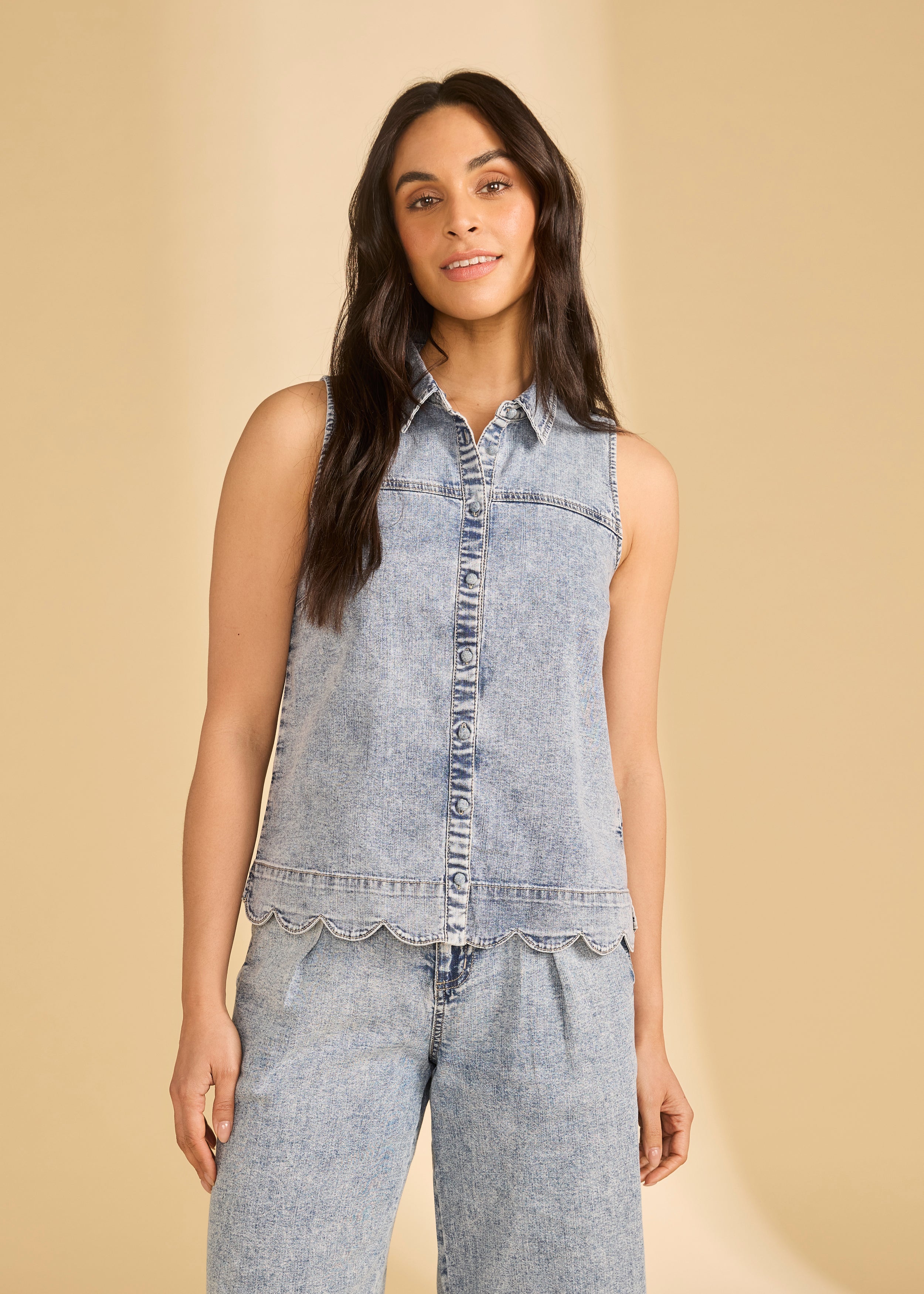 Close-up of sleeveless denim top in powder wash with button-down front by French Dressing Jeans (FDJ)