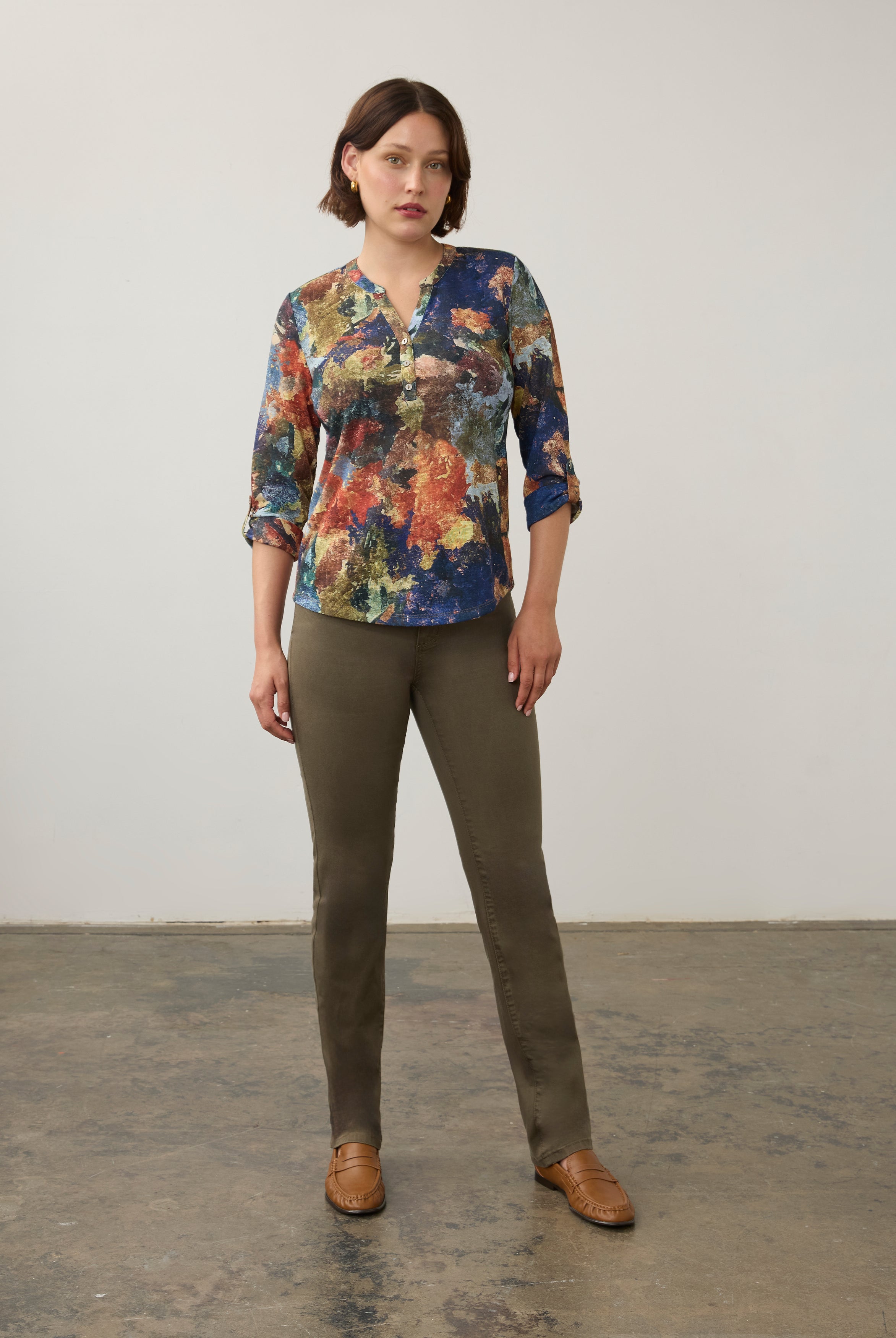 Full body view of multicolor Henley top with olive pants and tan loafers by French Dressing Jeans (FDJ)