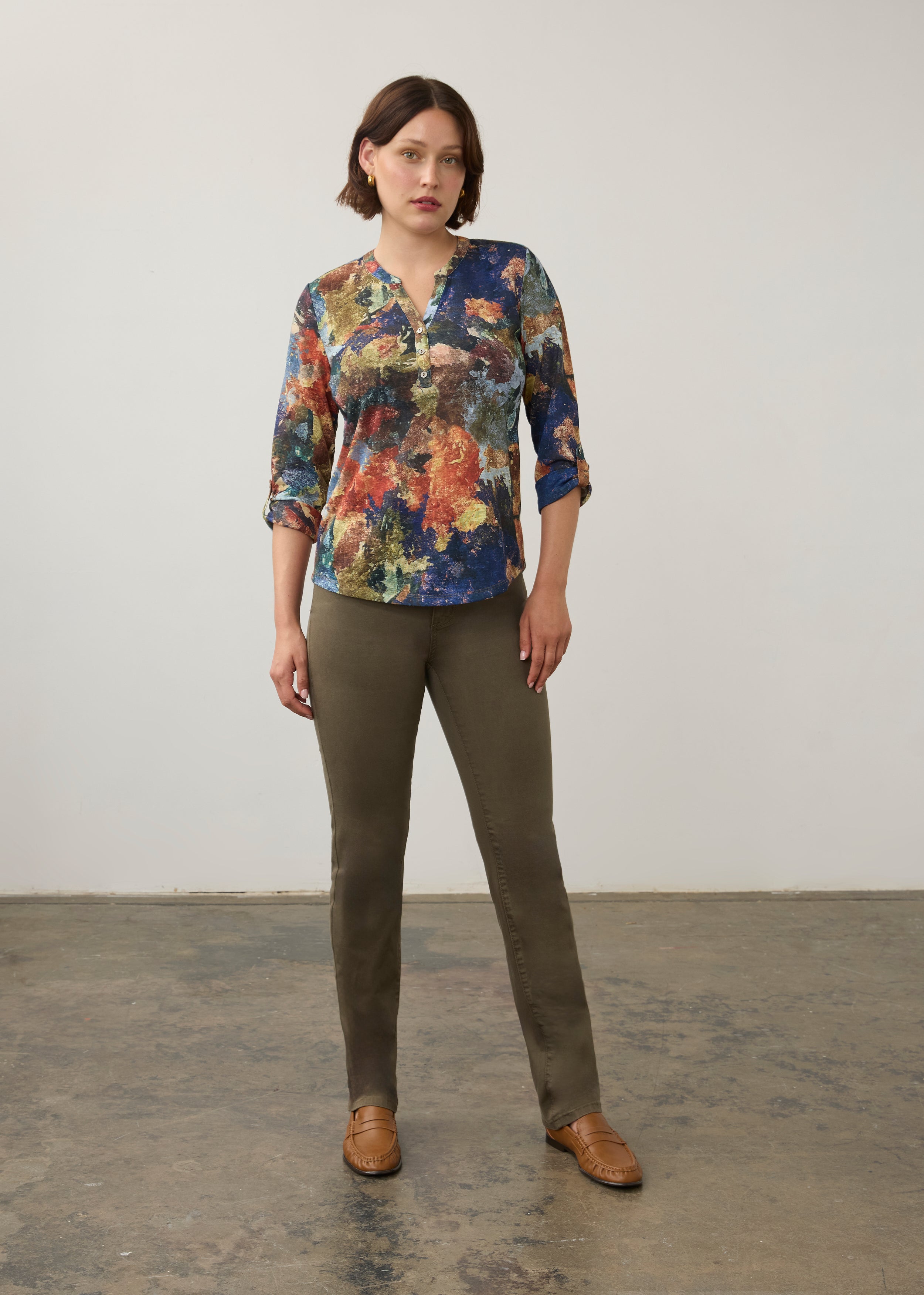 Full body view of multicolor Henley top with olive pants and tan loafers by French Dressing Jeans (FDJ)