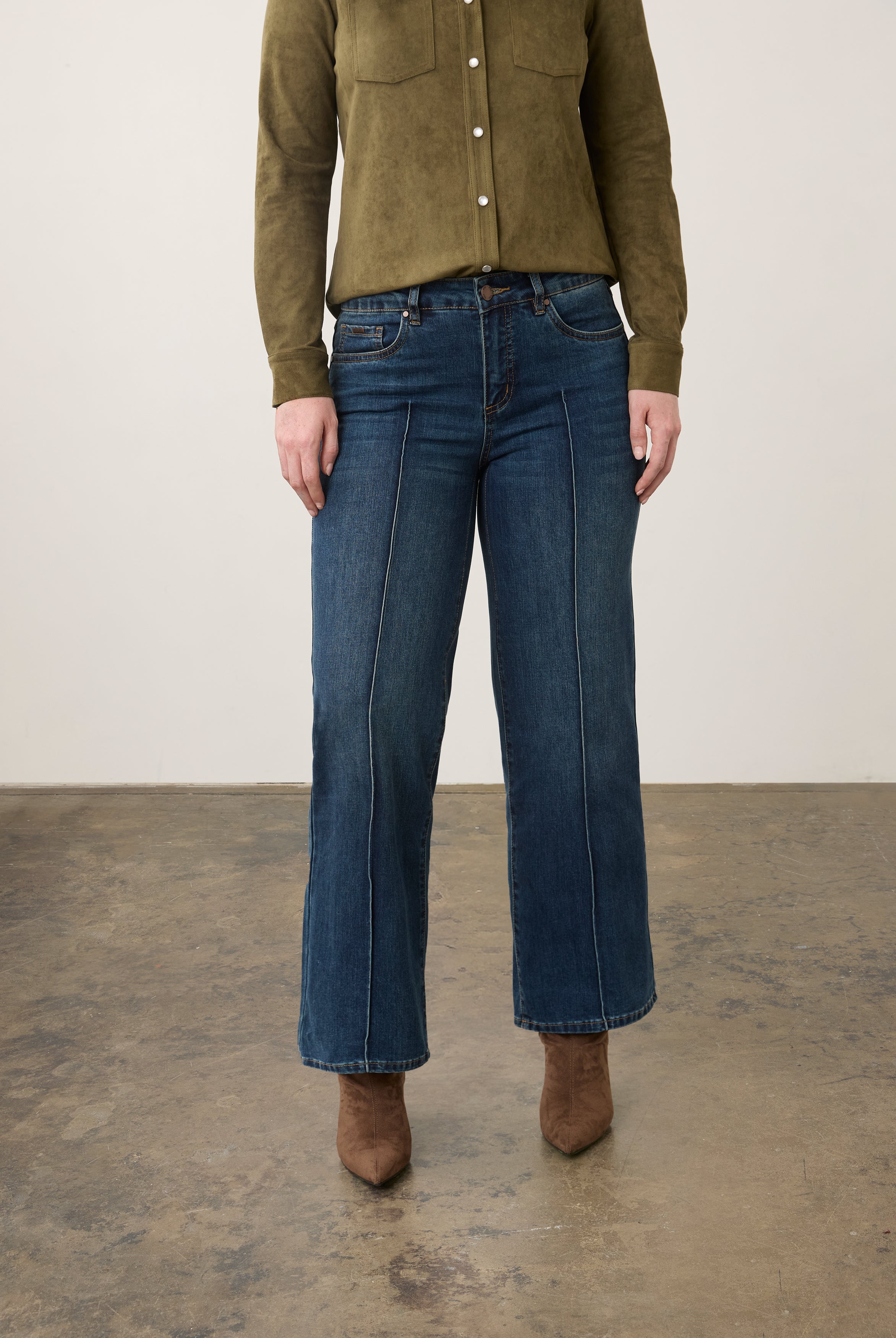 Front view of medium blue wide-leg denim highlighting mid-rise and front seam detail by French Dressing Jeans (FDJ)