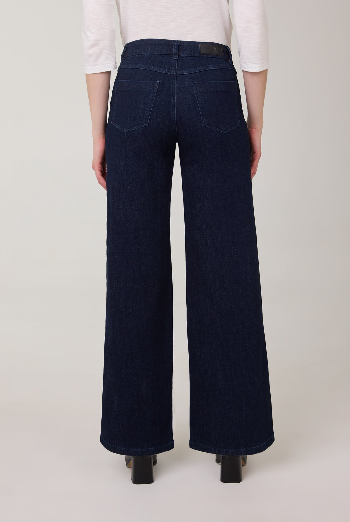 Back view of dark Delight wide-leg jeans highlighting fit by French Dressing Jeans (FDJ)