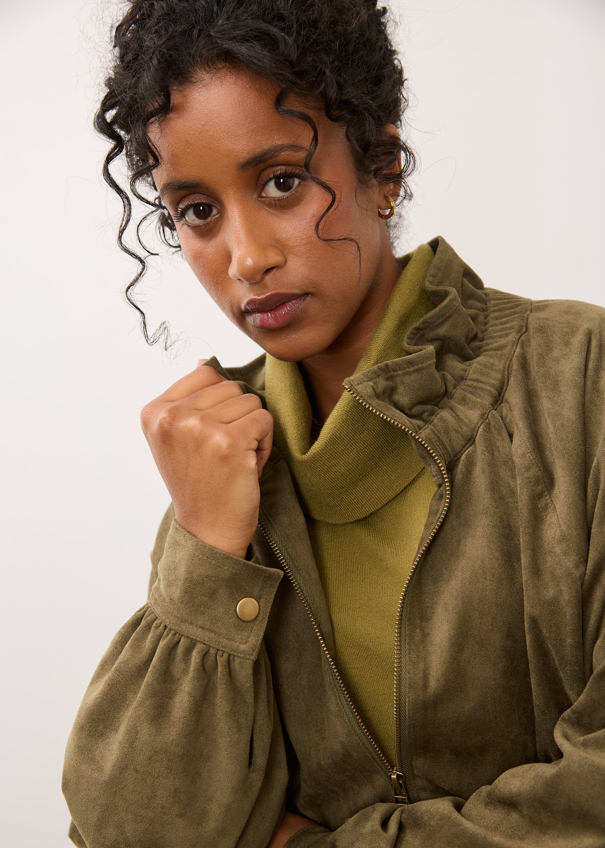 Close-up of olive jacket showing collar and zipper closure details by French Dressing Jeans (FDJ)