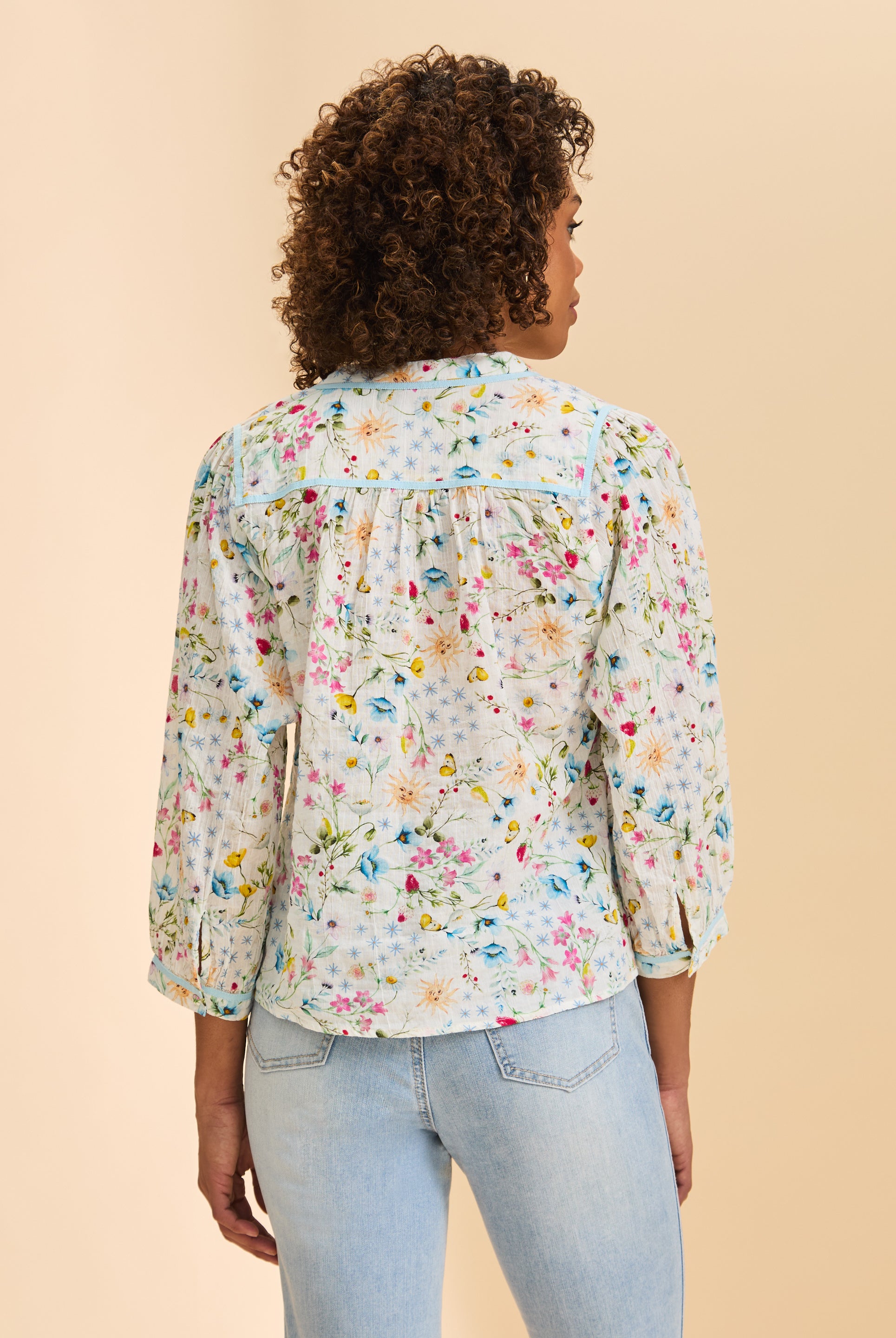 Back view of floral print blouse highlighting gathered yoke by French Dressing Jeans (FDJ)