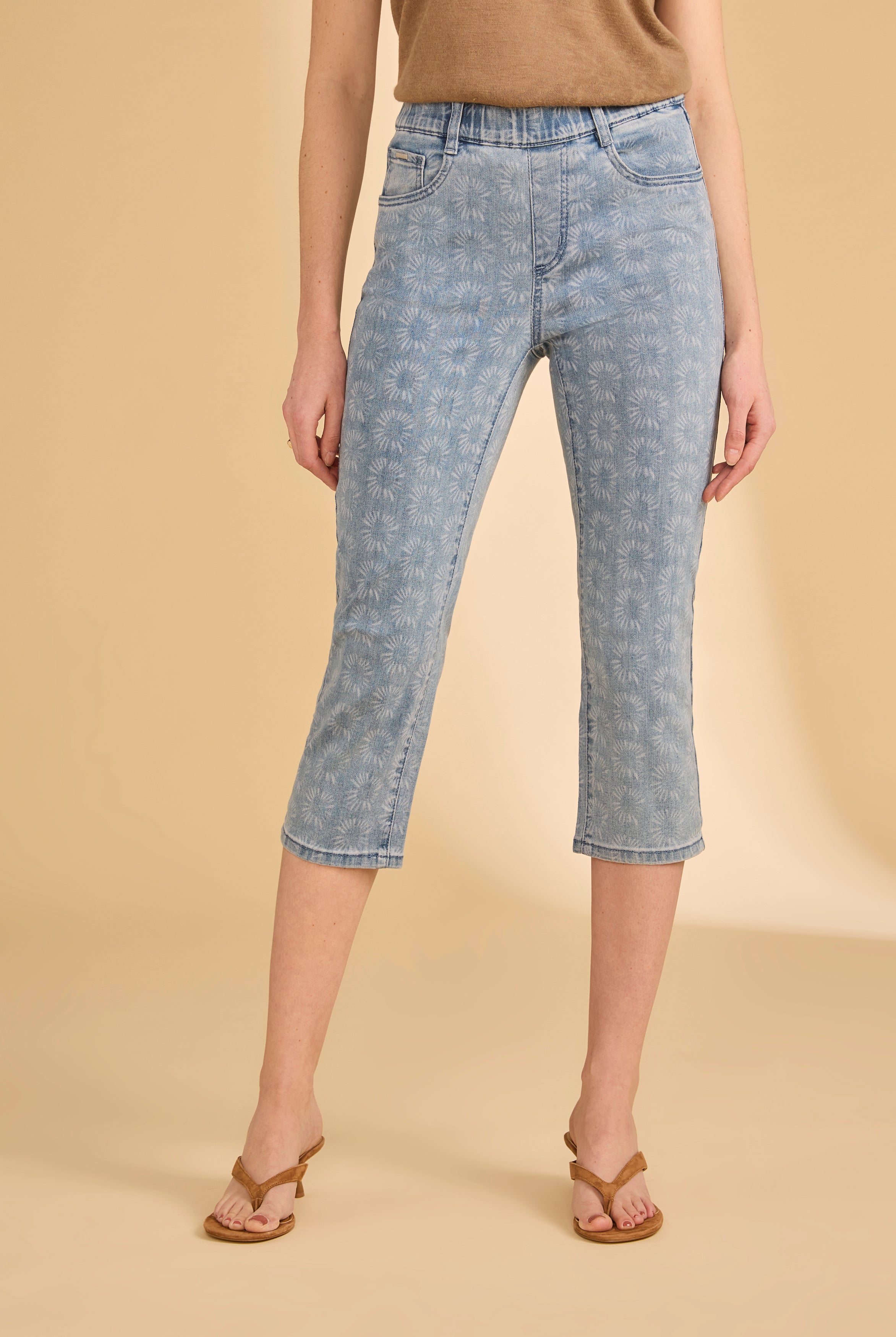 Front view of light medium capri denim with subtle floral print and beige top by French Dressing Jeans (FDJ)