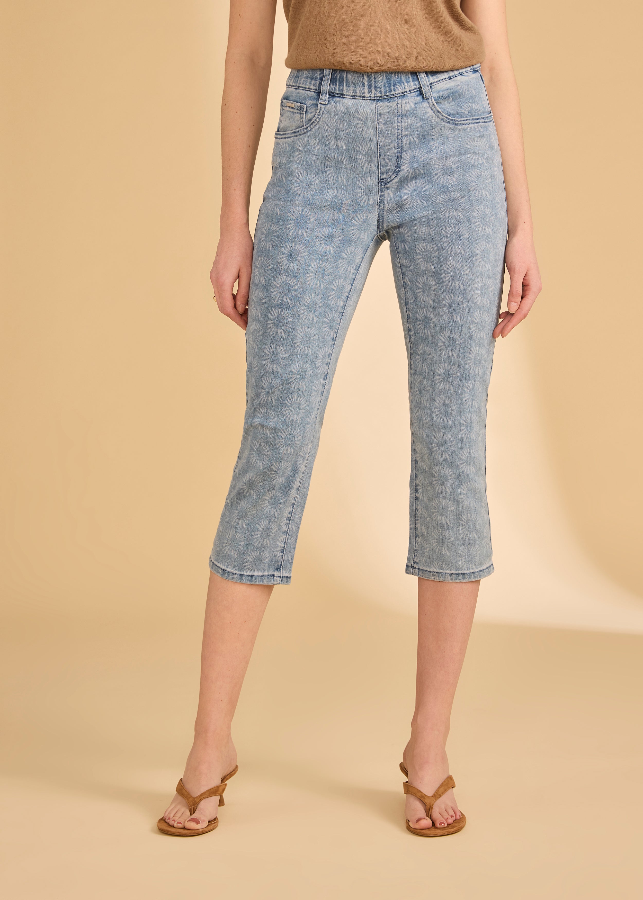 Front view of light medium capri denim with subtle floral print and beige top by French Dressing Jeans (FDJ)