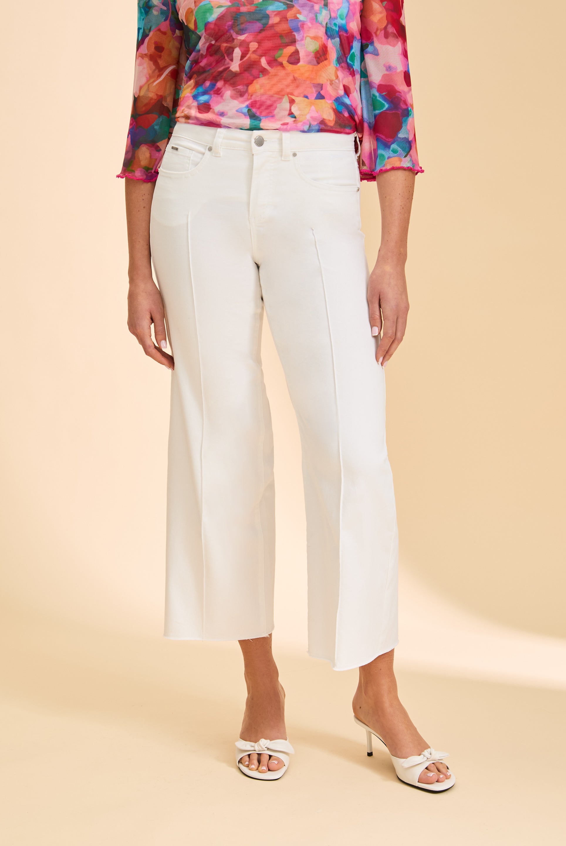 Close-up of white pants with front seam details by French Dressing Jeans (FDJ)
