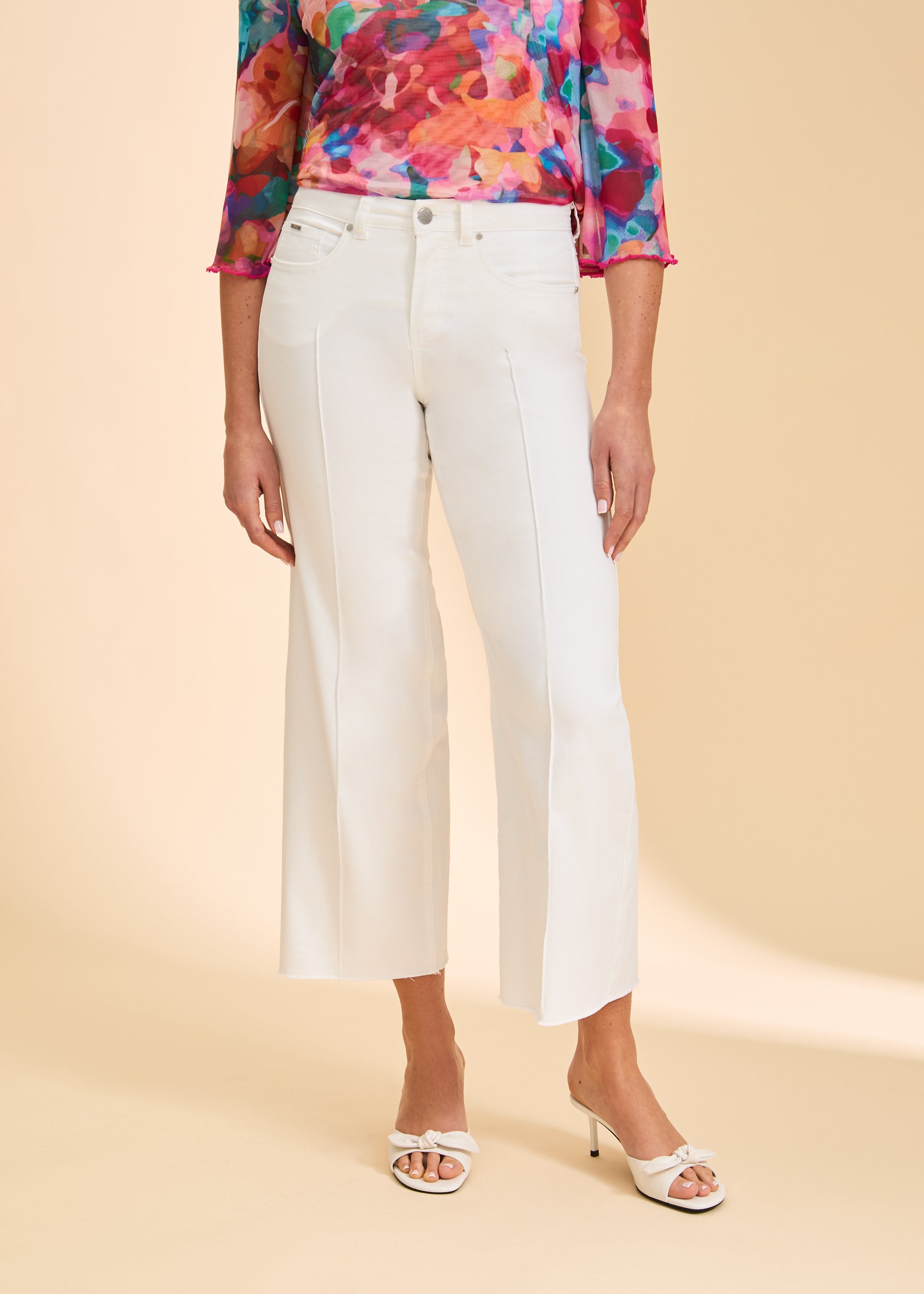 Close-up of white pants with front seam details by French Dressing Jeans (FDJ)