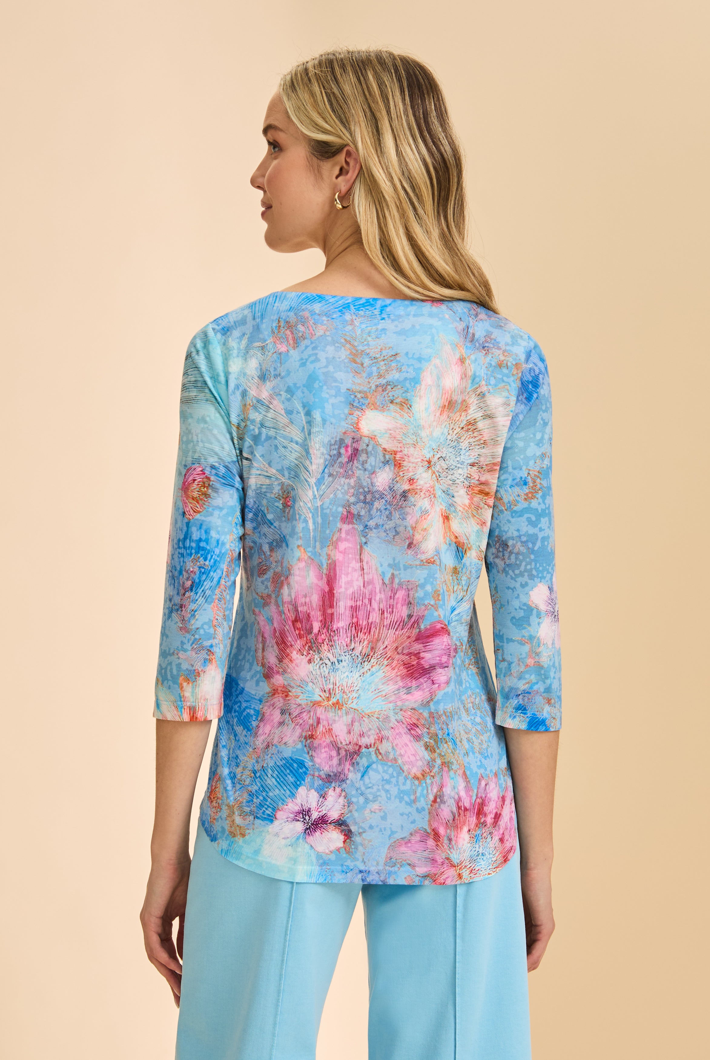 Back view of blue floral top showcasing 3/4 sleeves and relaxed fit by French Dressing Jeans (FDJ)