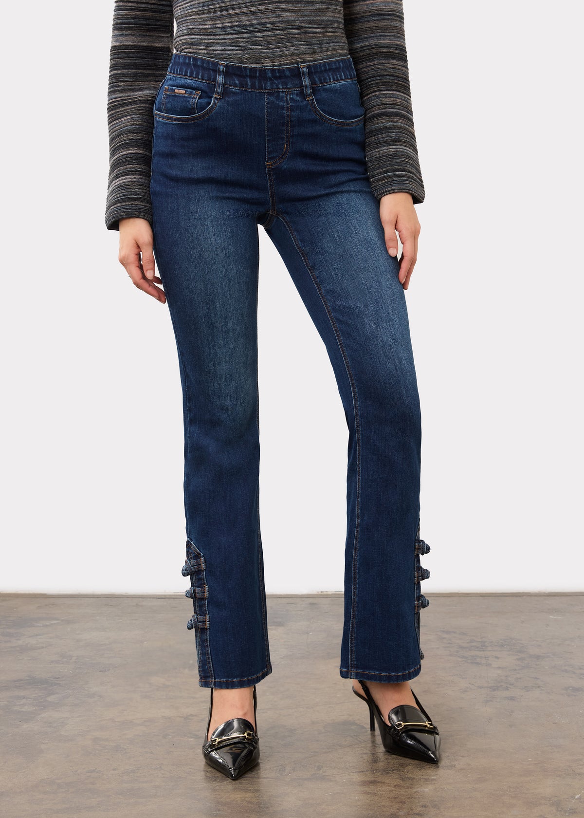 Front view of dark blue pull-on denim showcasing unique button details by French Dressing Jeans (FDJ)