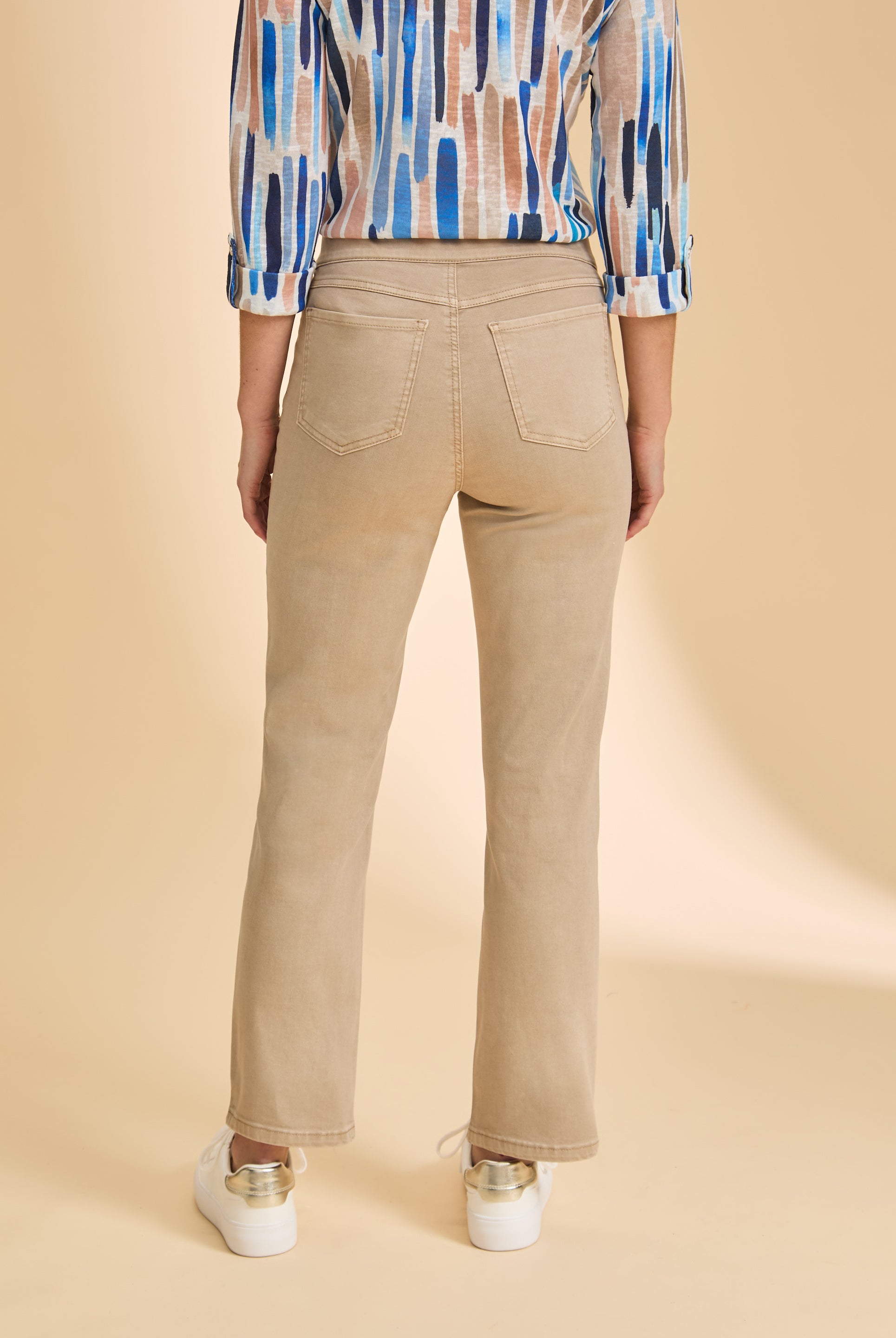 Back view of sand straight-leg jeans, showcasing tailored pocket detail by French Dressing Jeans (FDJ)