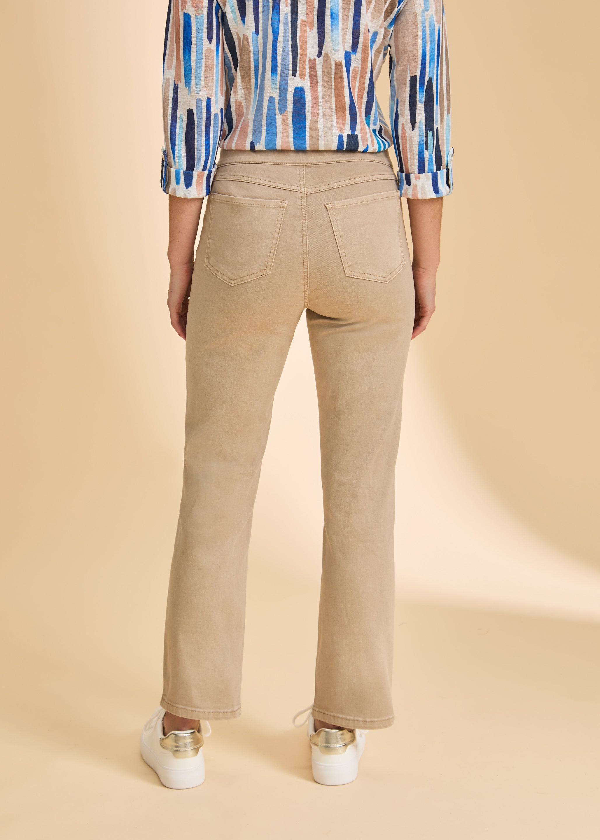 Back view of sand straight-leg jeans, showcasing tailored pocket detail by French Dressing Jeans (FDJ)