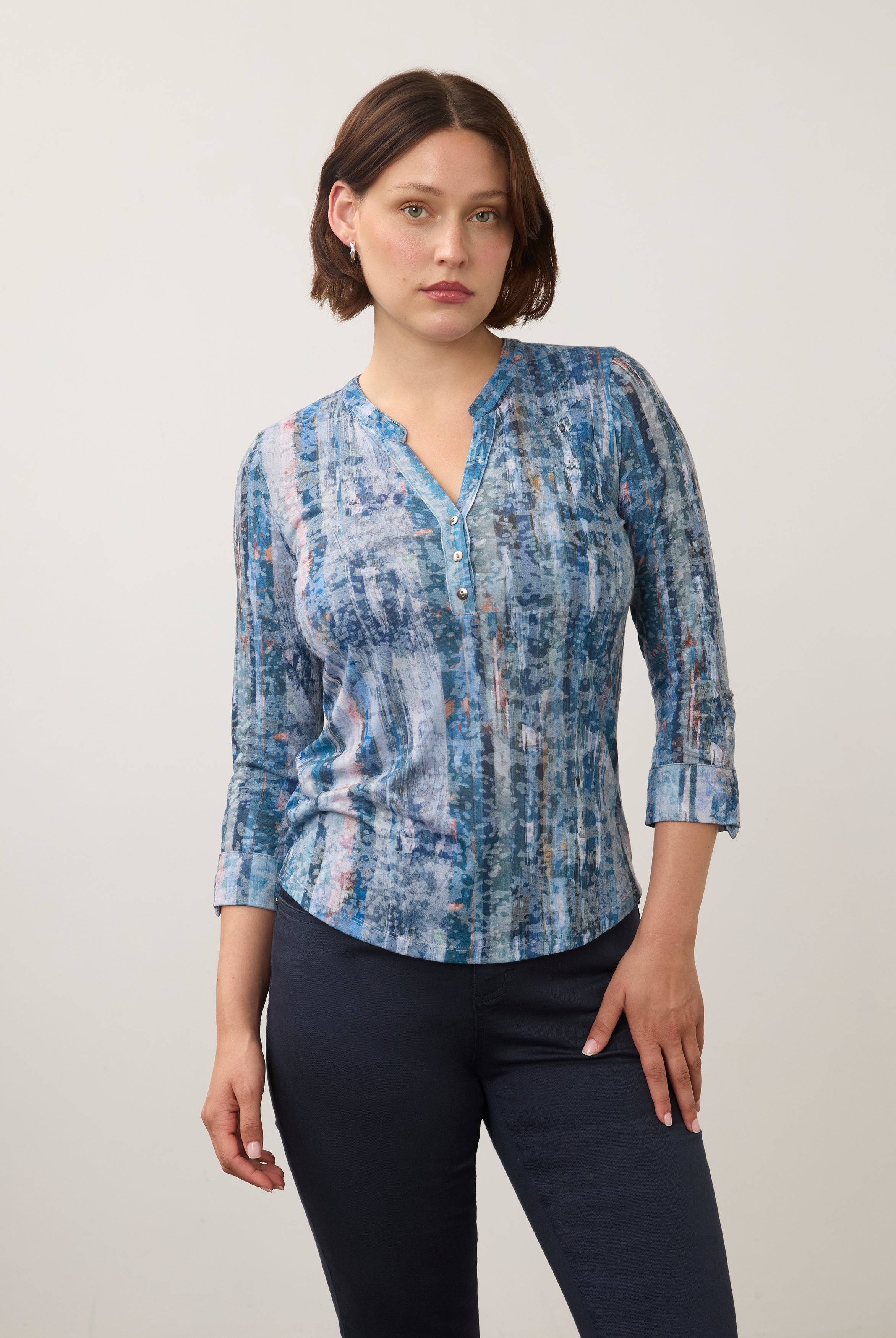 Front view of 3/4 sleeve top with button detail and abstract blue pattern by French Dressing Jeans (FDJ)