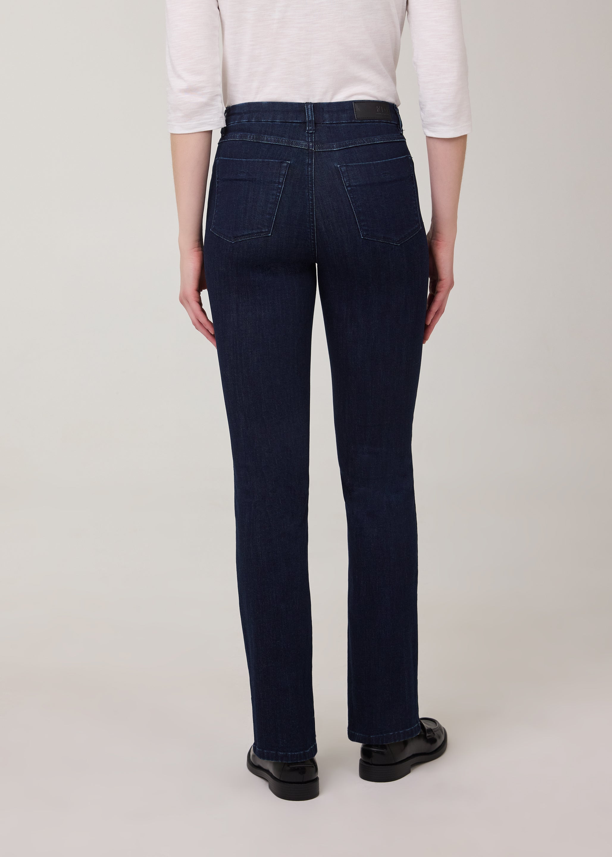 Back view of flared leg jeans in Delight color with patch pockets by French Dressing Jeans (FDJ)