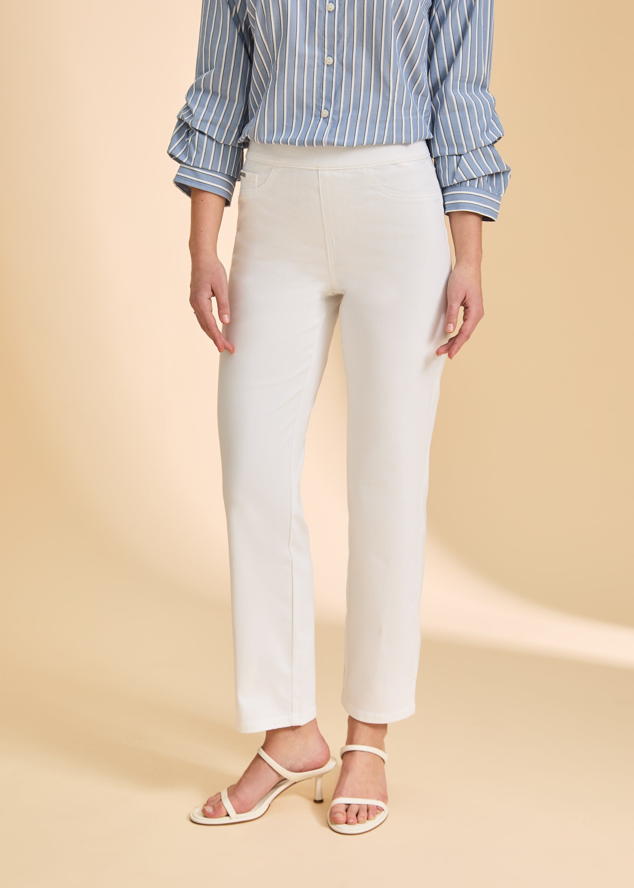 Close-up front view of white straight-leg jeans, highlighting comfort fit by French Dressing Jeans (FDJ)