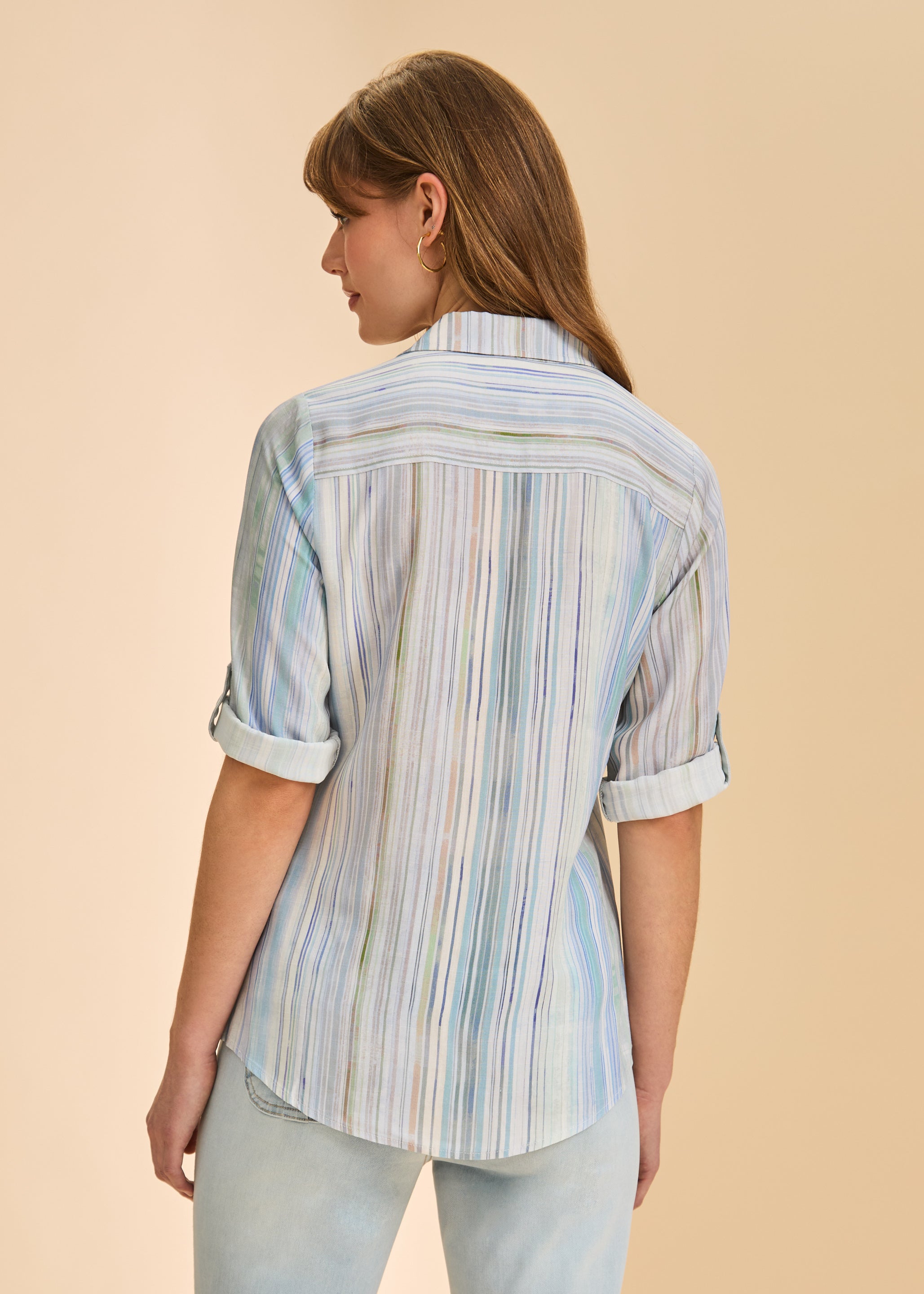 Back view of pastel striped shirt showcasing vertical stripes by French Dressing Jeans (FDJ)