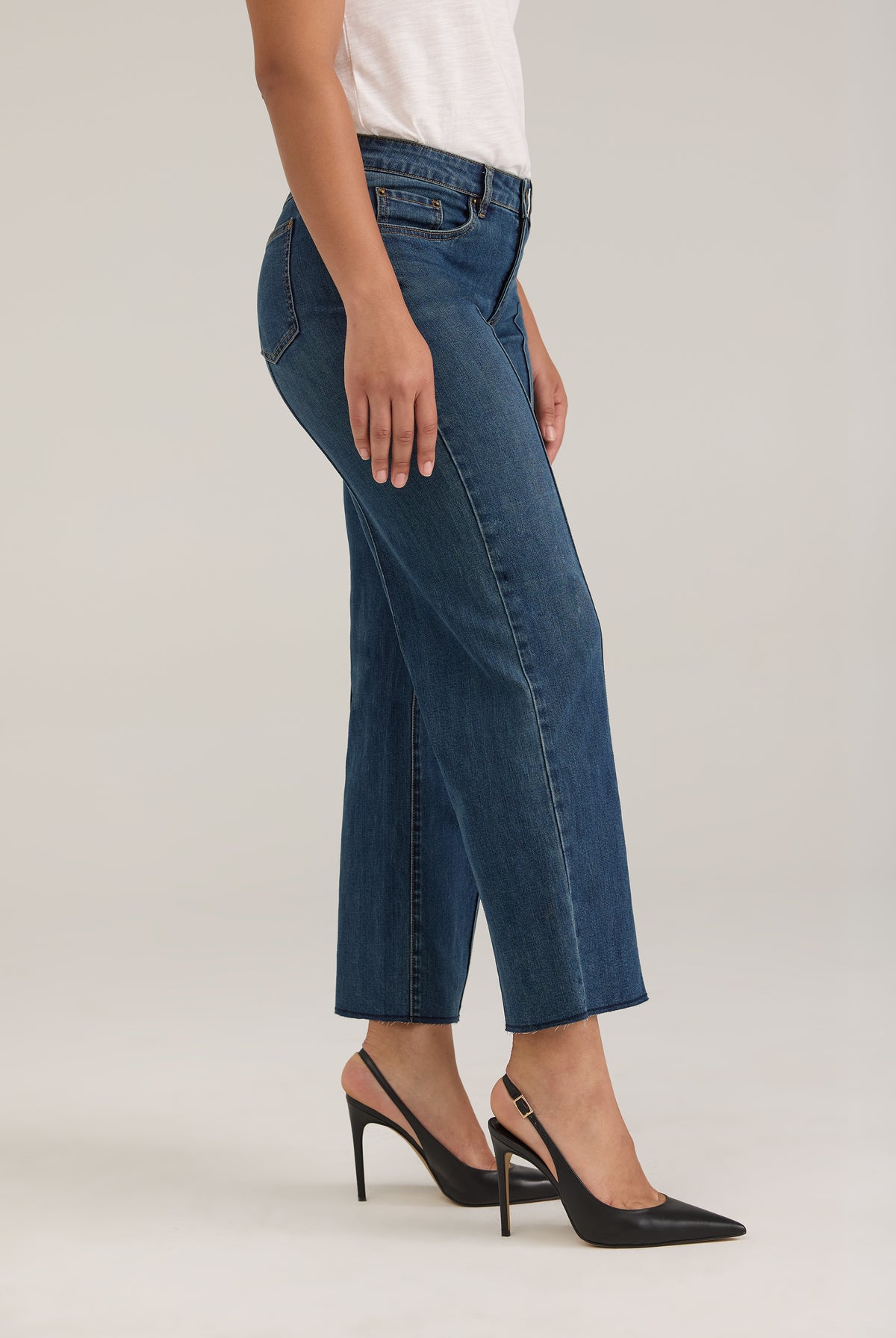 Side profile of Olivia denim in dark wash highlighting wide ankle and mid-rise waist by French Dressing Jeans (FDJ)