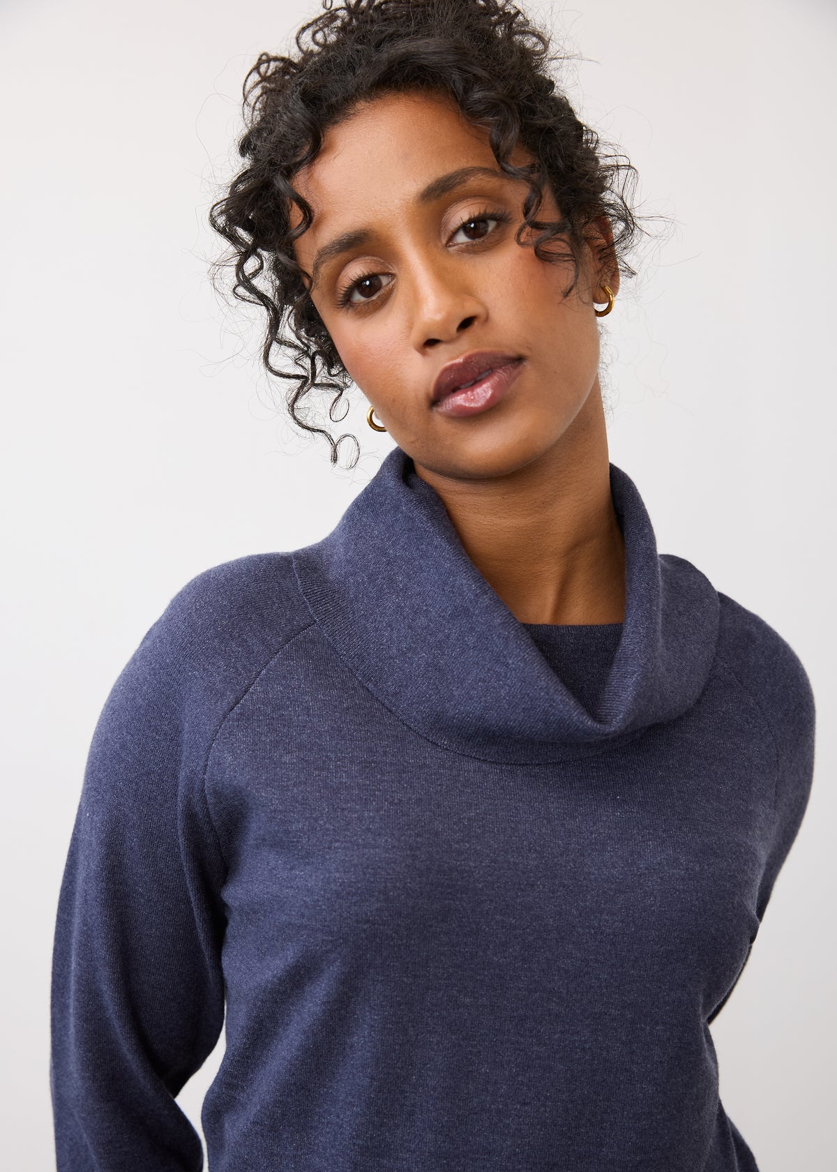 Close-up of navy sweater showcasing cowl neck design by French Dressing Jeans (FDJ)