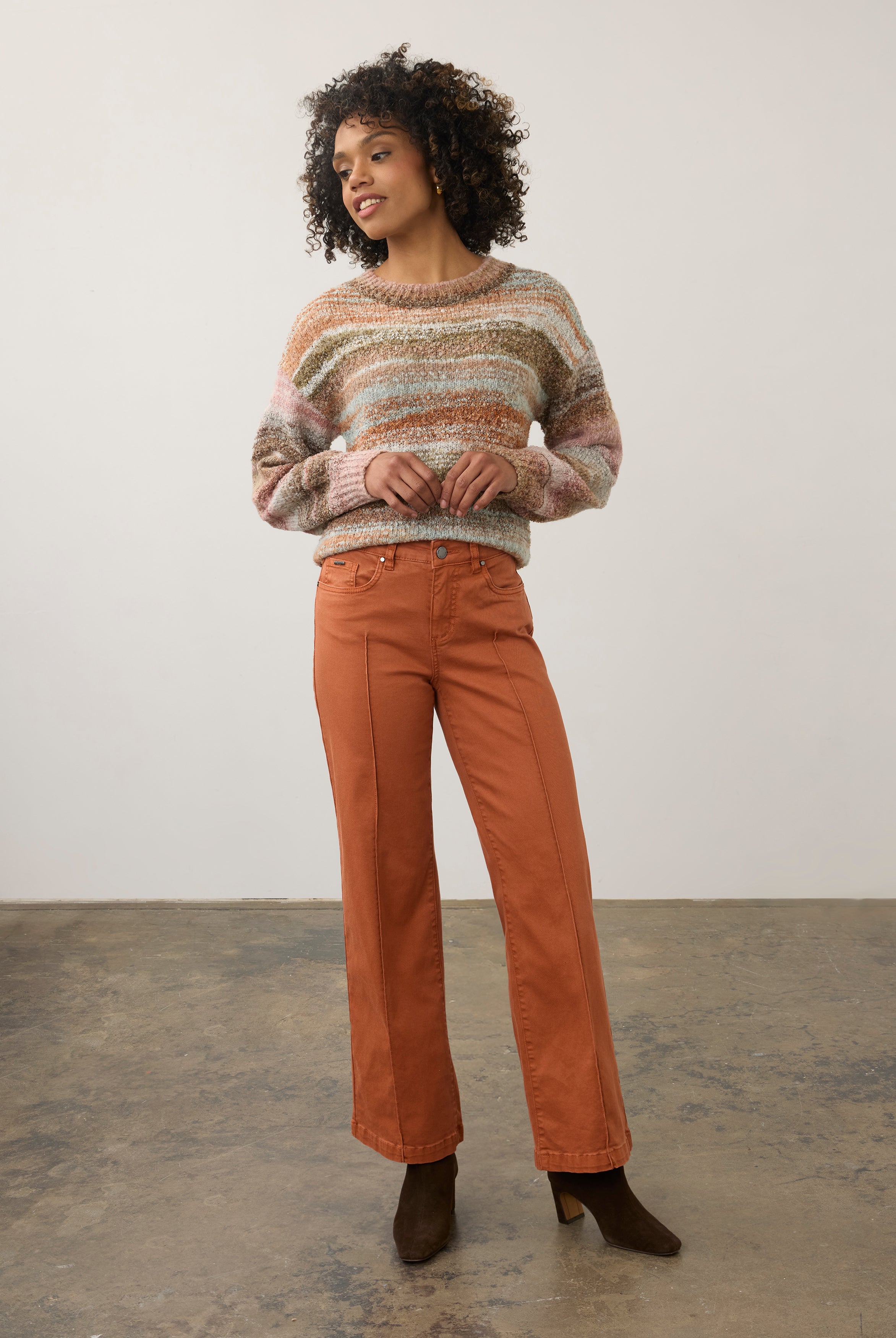 Full view of terracotta wide-leg denim styled with pastel sweater by French Dressing Jeans (FDJ) par French Dressing Jeans (FDJ)