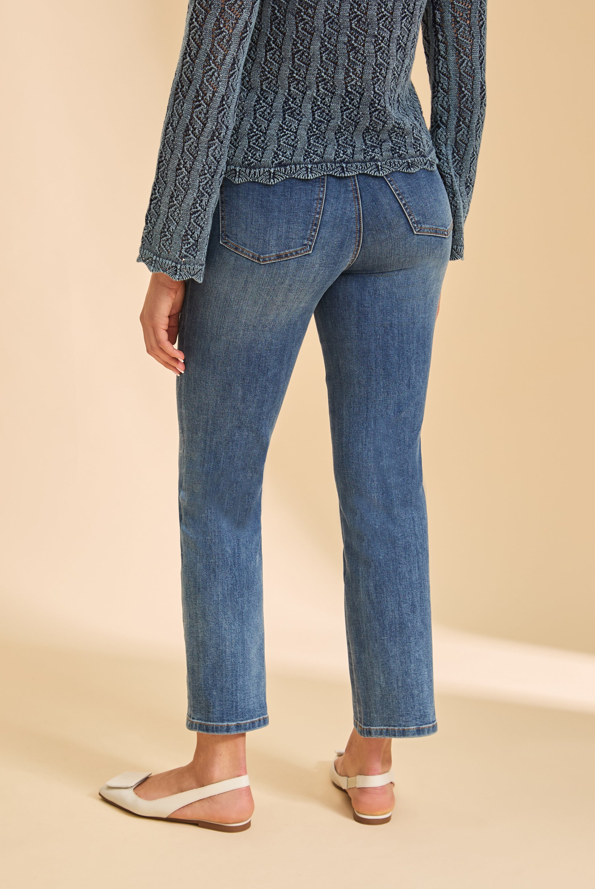 Back view of indigo straight leg jeans featuring back patch pockets by French Dressing Jeans (FDJ)