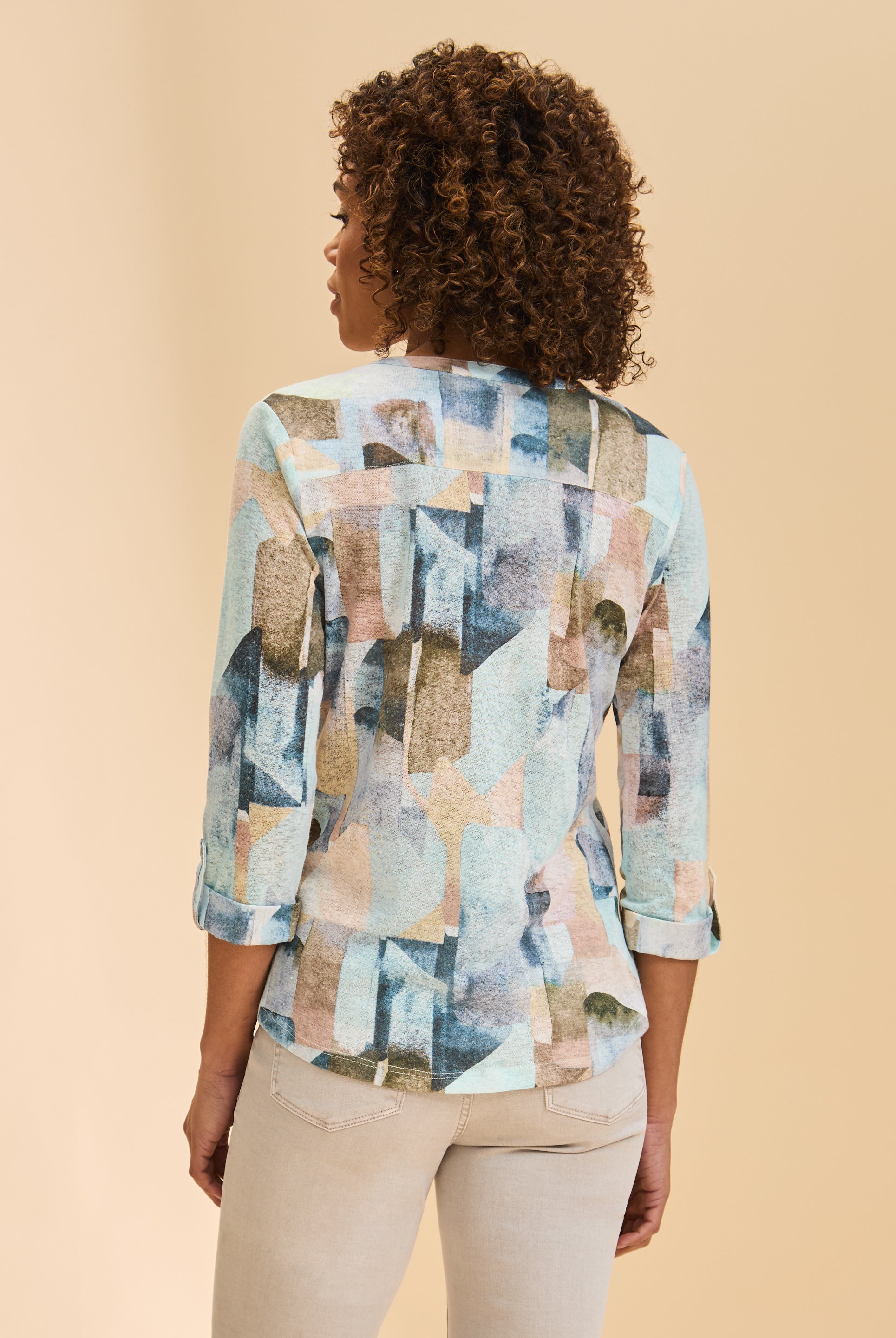 Back view of 3/4 sleeve Henley top showing abstract pattern in coppertone by French Dressing Jeans (FDJ)