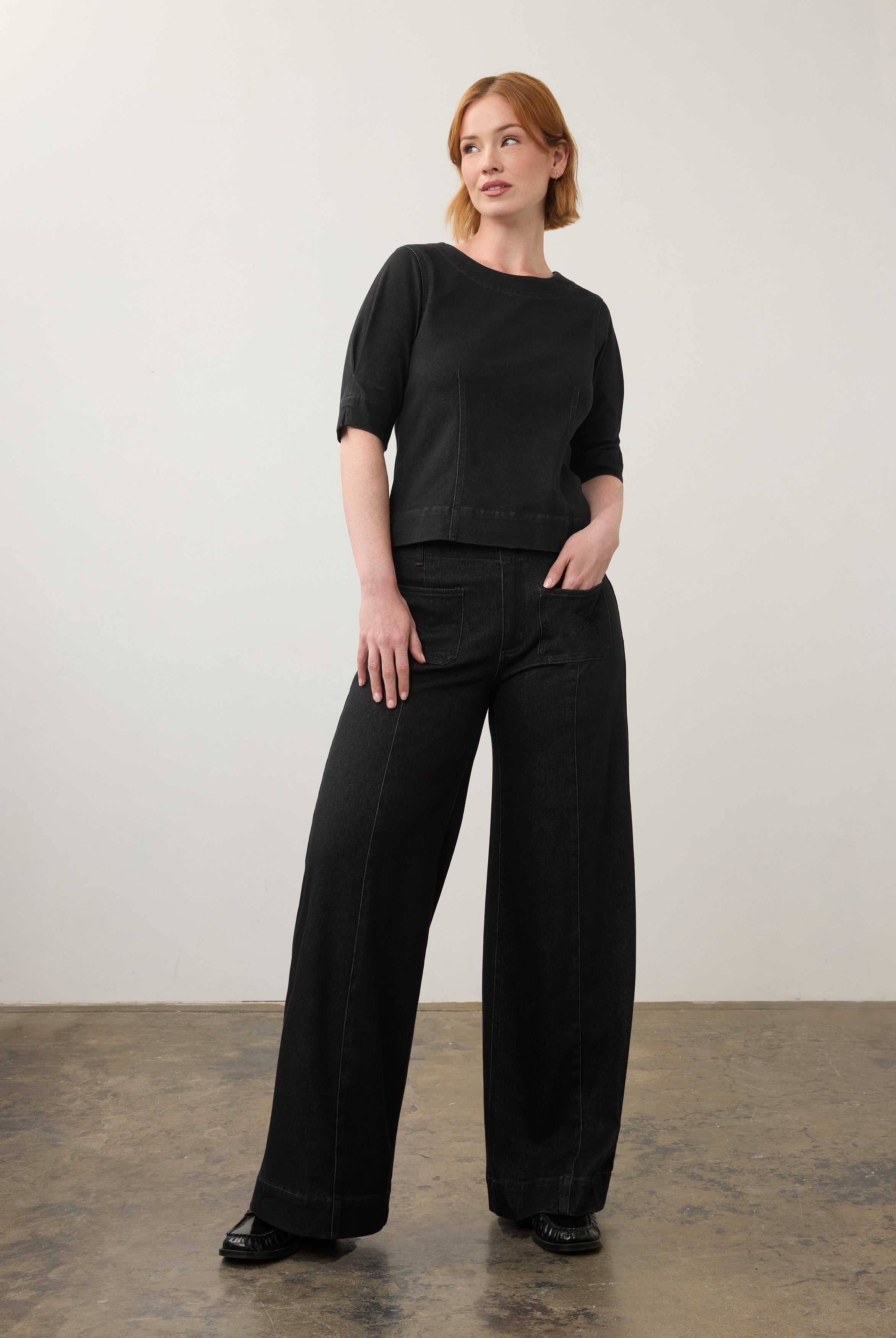 Black wide-leg jeans paired with matching top in full outfit view by French Dressing Jeans (FDJ)