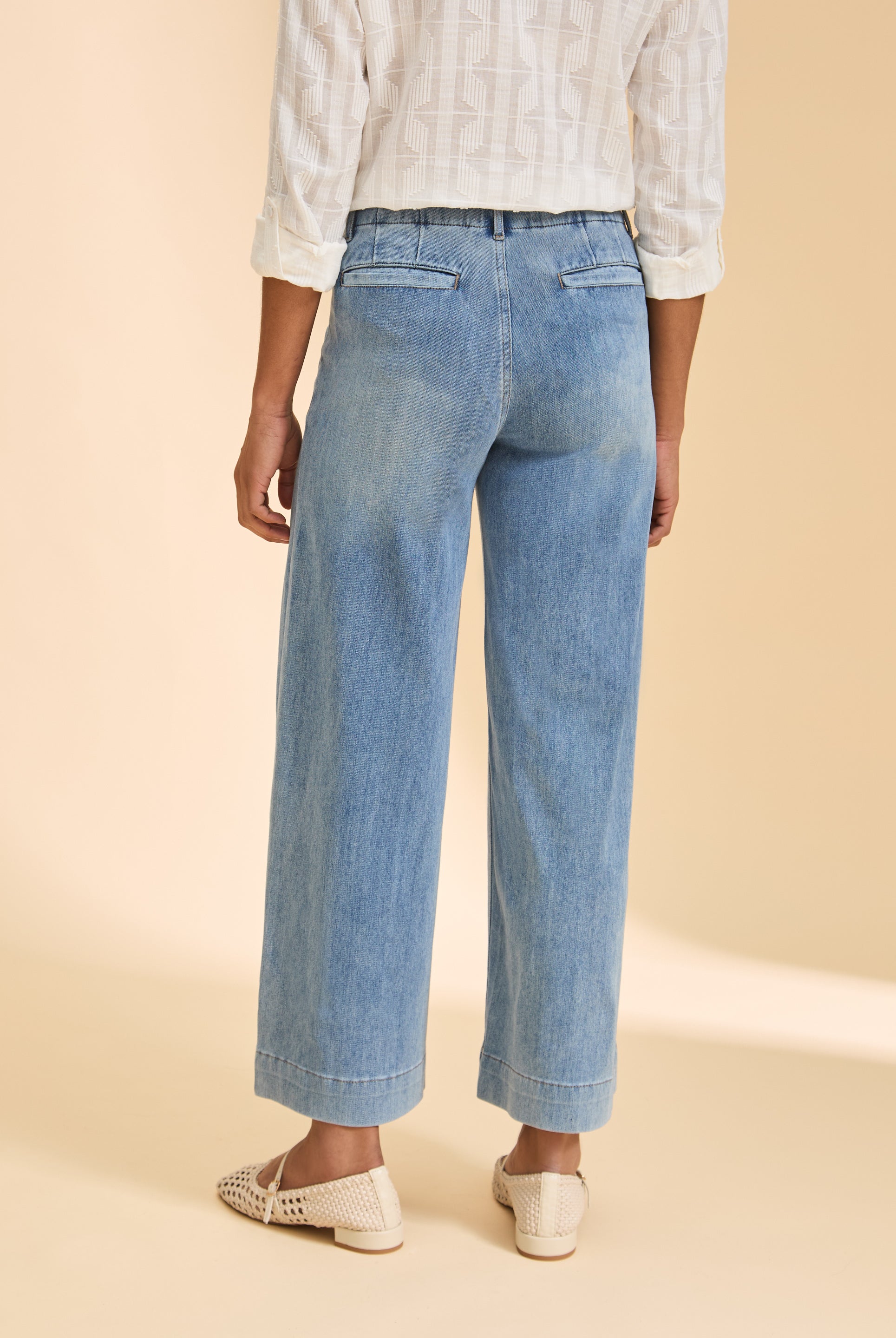 Back view of light blue wide-leg jeans with welt pockets by French Dressing Jeans (FDJ)
