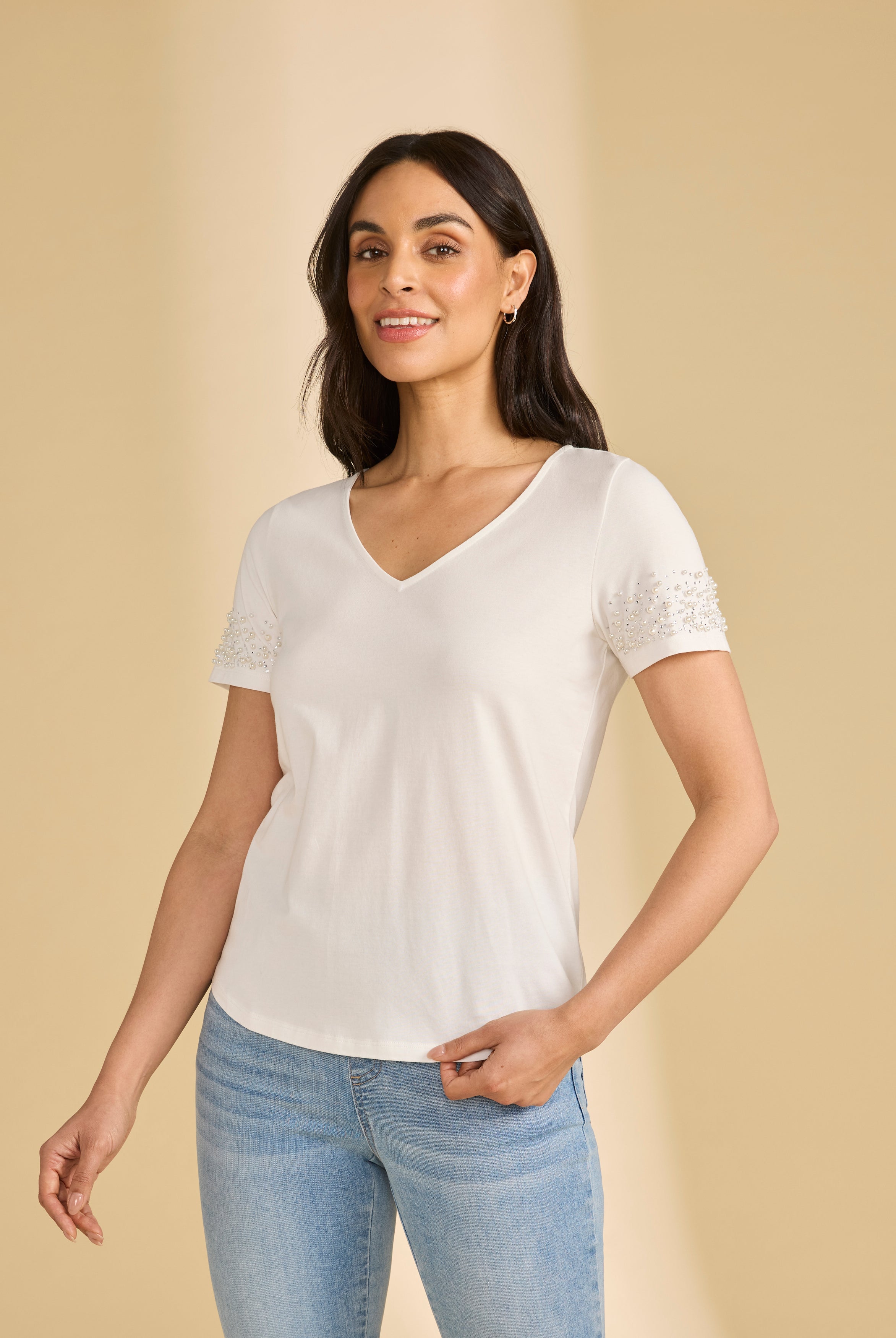 Front view of white V-neck top with pearl-trimmed short sleeves by French Dressing Jeans (FDJ)
