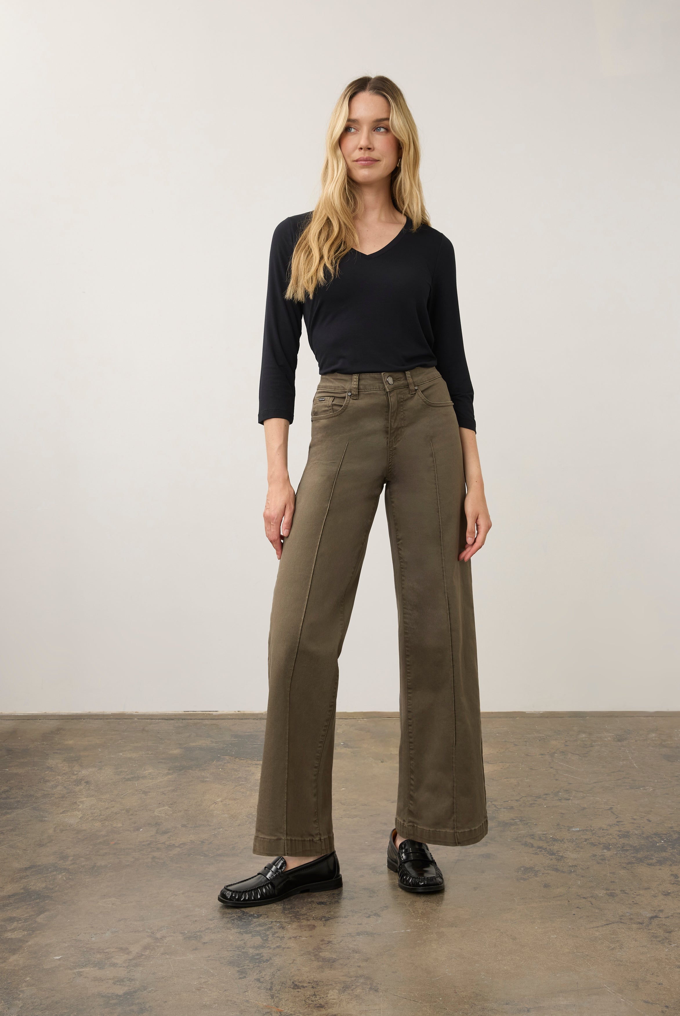 Full view of olive wide-leg denim paired with black top by French Dressing Jeans (FDJ) par French Dressing Jeans (FDJ)