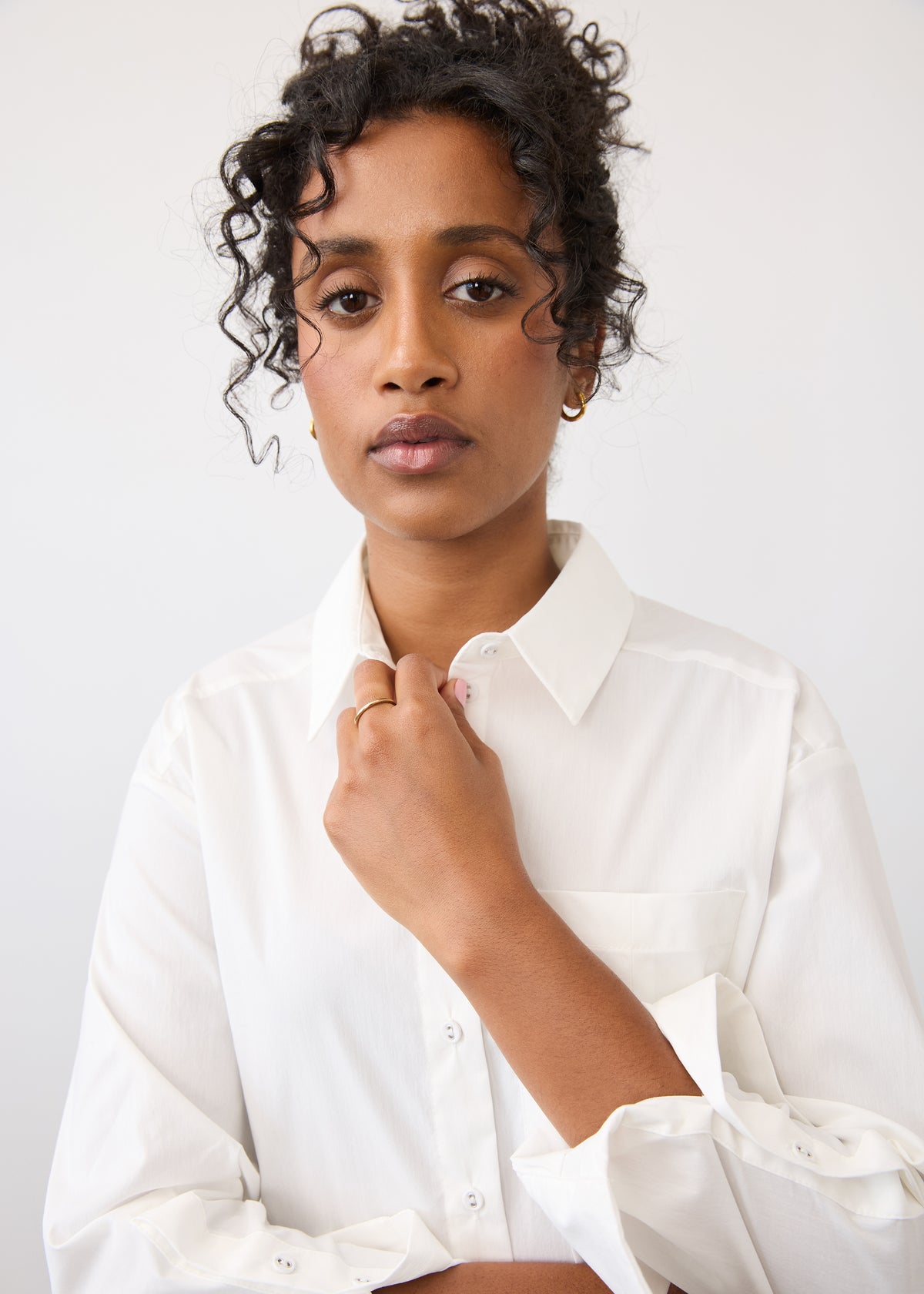 Close-up of white shirt highlighting collar and button details by French Dressing Jeans (FDJ)