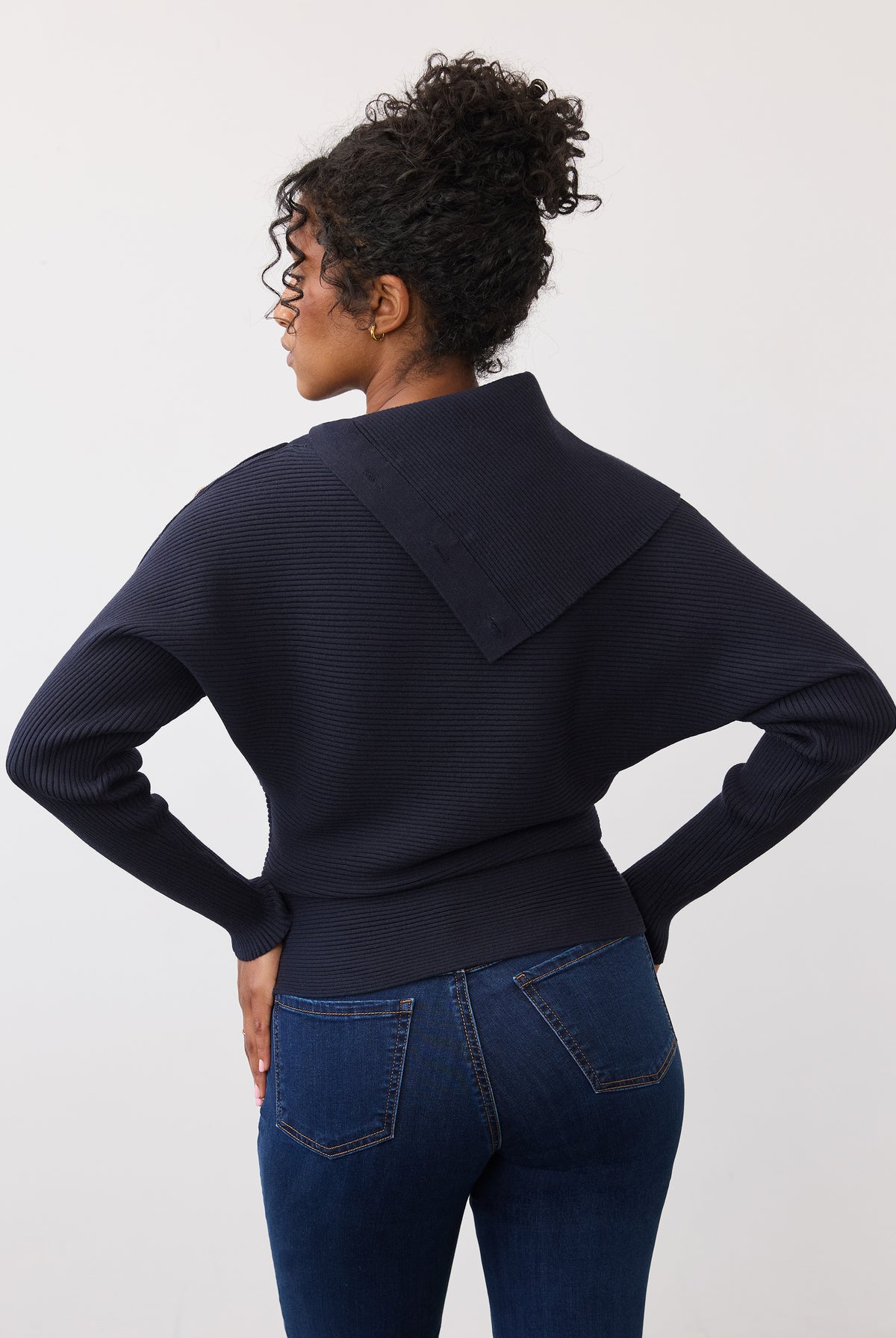 Back view of navy sweater highlighting ribbed texture and buttoned back design by French Dressing Jeans (FDJ)