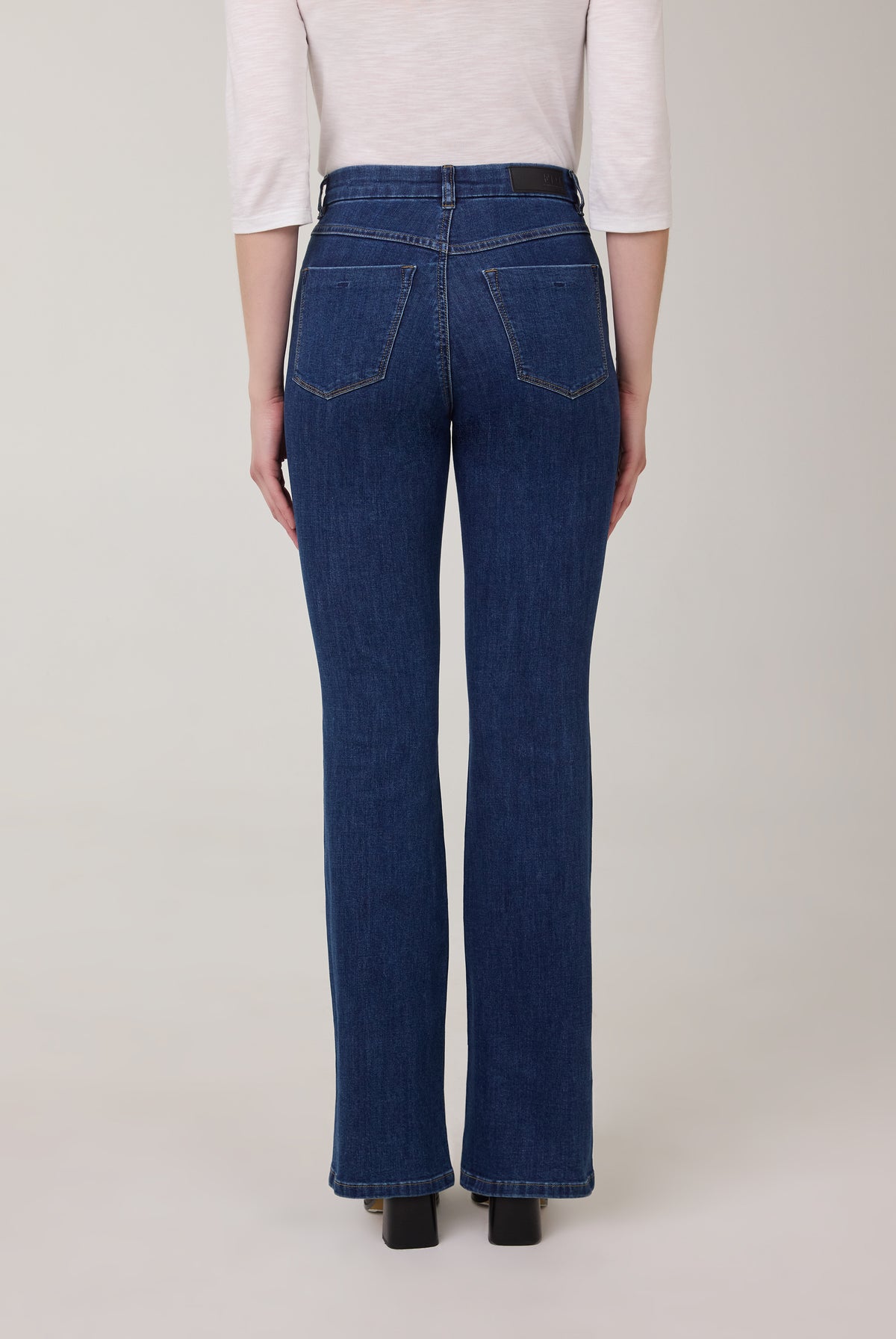 Back view of bootcut denim jeans in dark Delight color by French Dressing Jeans (FDJ)