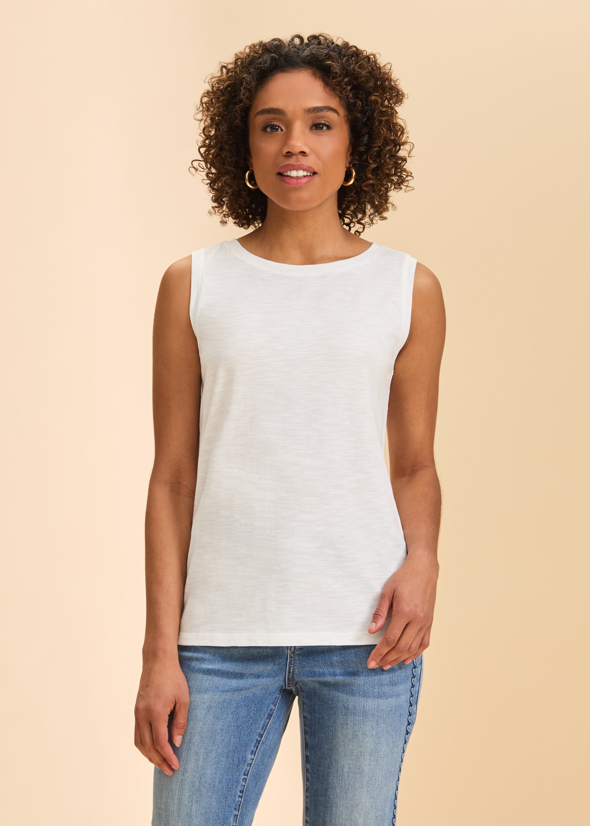 Front view of white sleeveless top with round neckline paired with classic denim by French Dressing Jeans (FDJ)