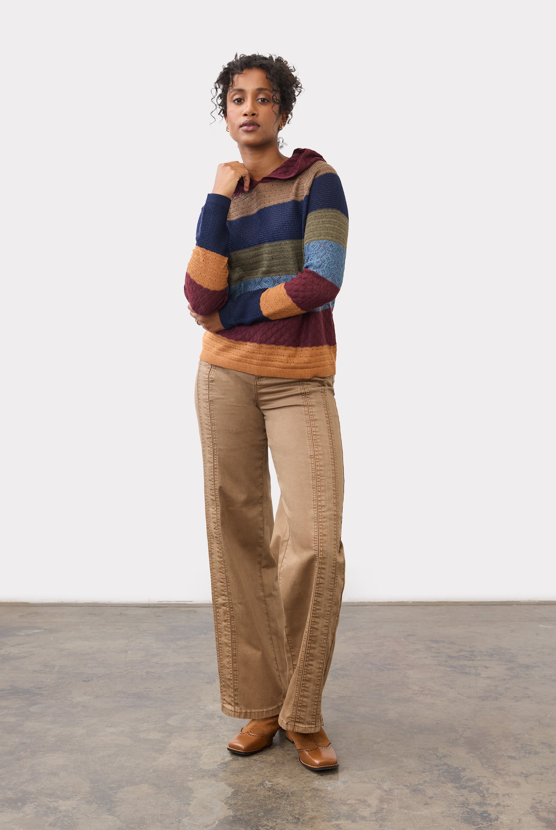 Full-body shot of maple wide leg denim paired with striped sweater, front view by French Dressing Jeans (FDJ)