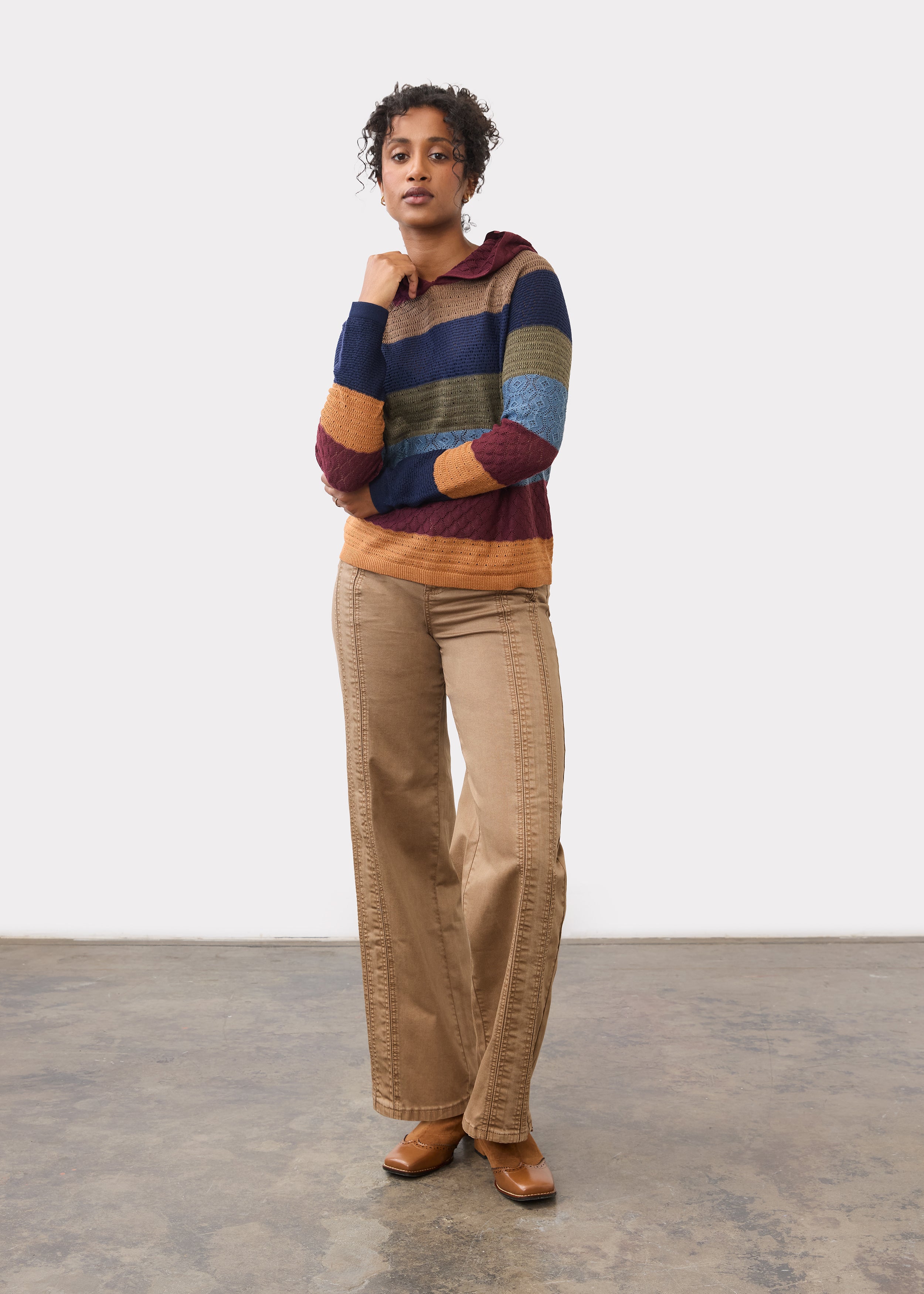 Full-body shot of maple wide leg denim paired with striped sweater, front view by French Dressing Jeans (FDJ)