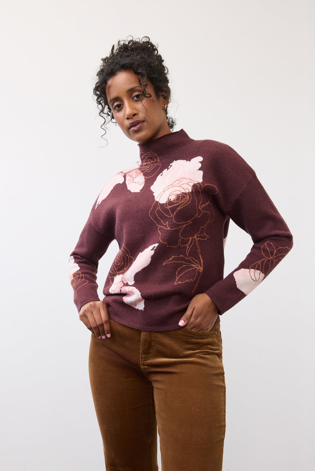 Front view of floral burgundy sweater with pink rose pattern and long sleeves by French Dressing Jeans (FDJ)