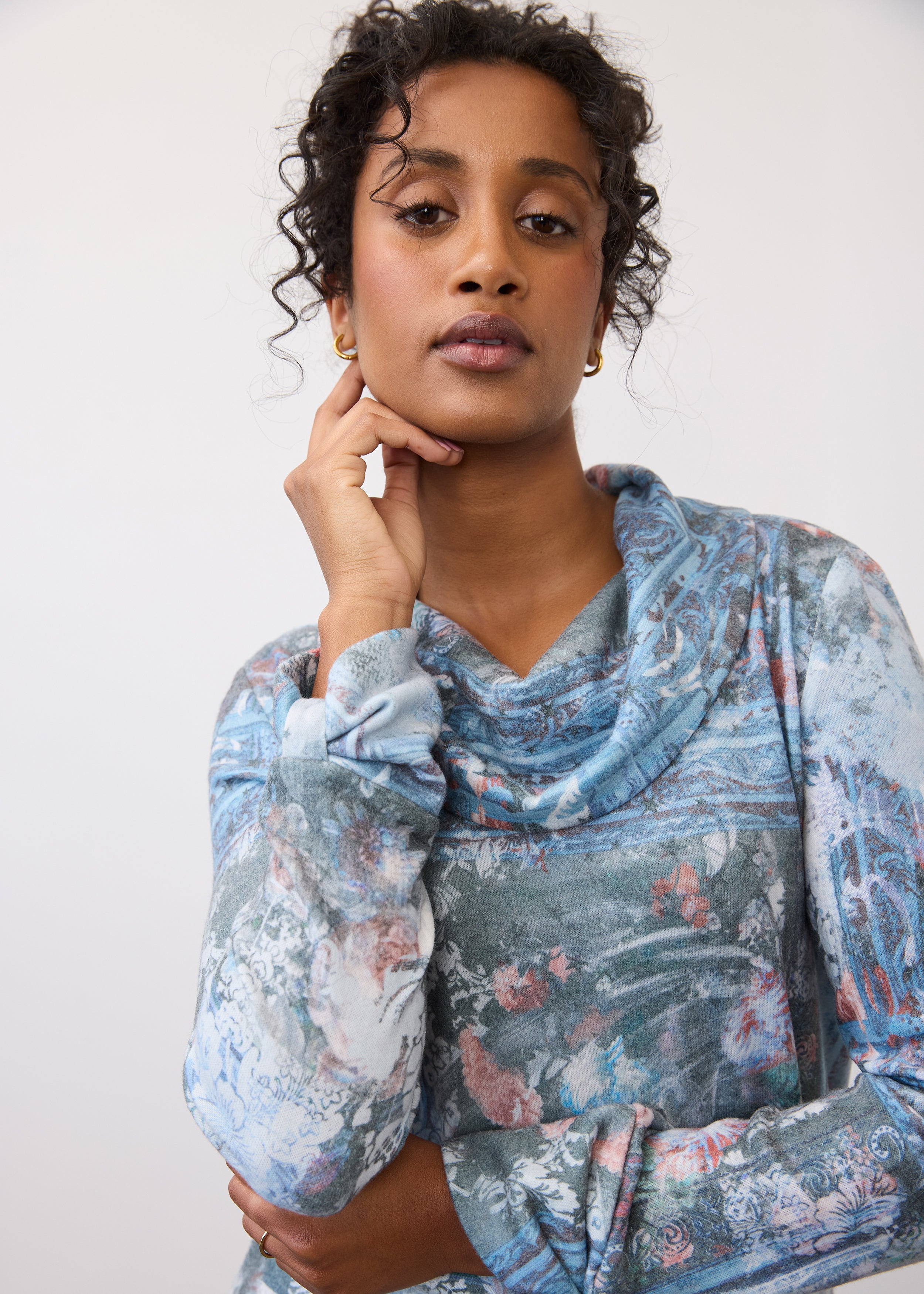 Close-up of indigo cowl neck top showcasing soft fabric and floral pattern by French Dressing Jeans (FDJ)