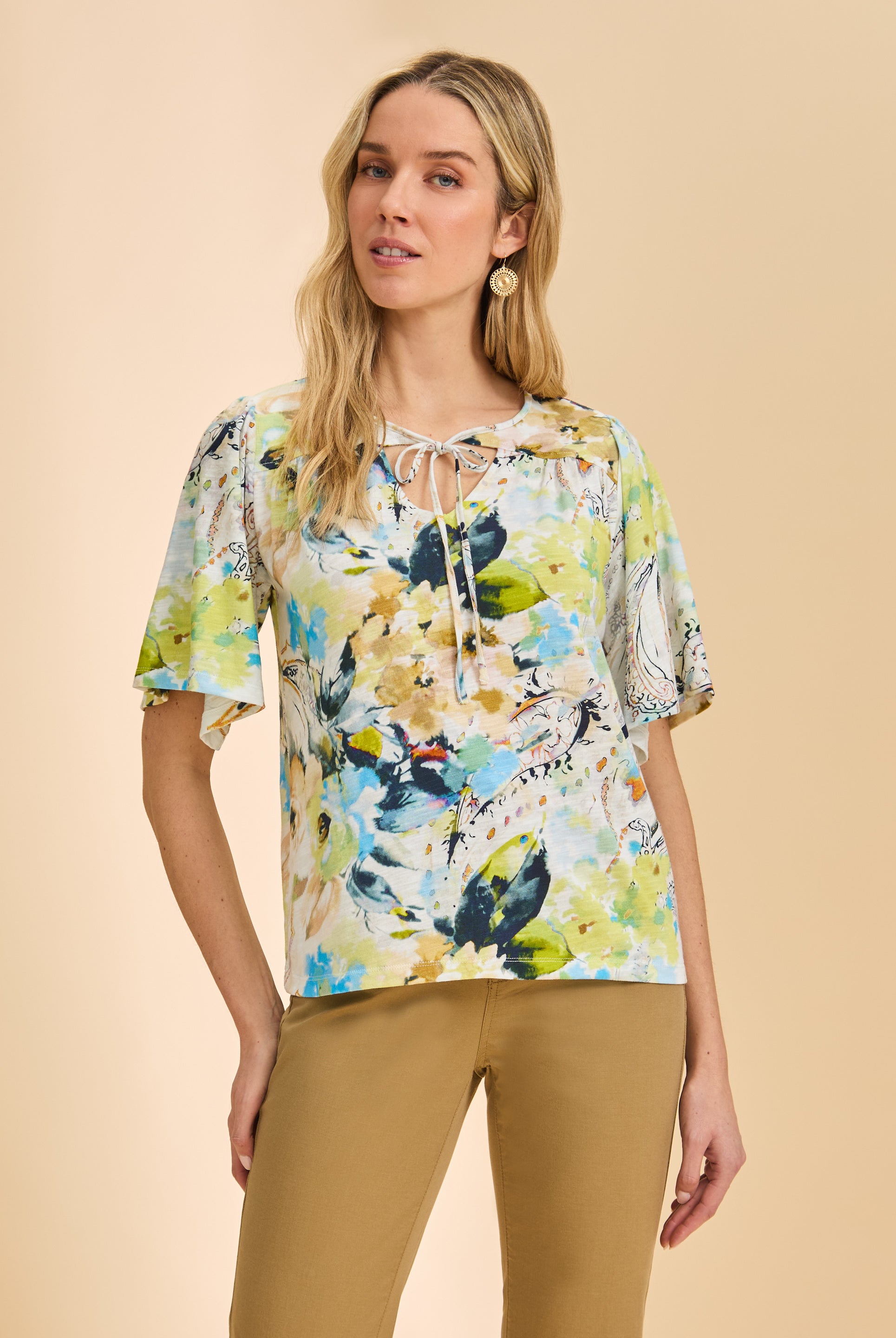 Front view of short sleeve V-neck top featuring a vibrant Pacific paisley print by French Dressing Jeans (FDJ)