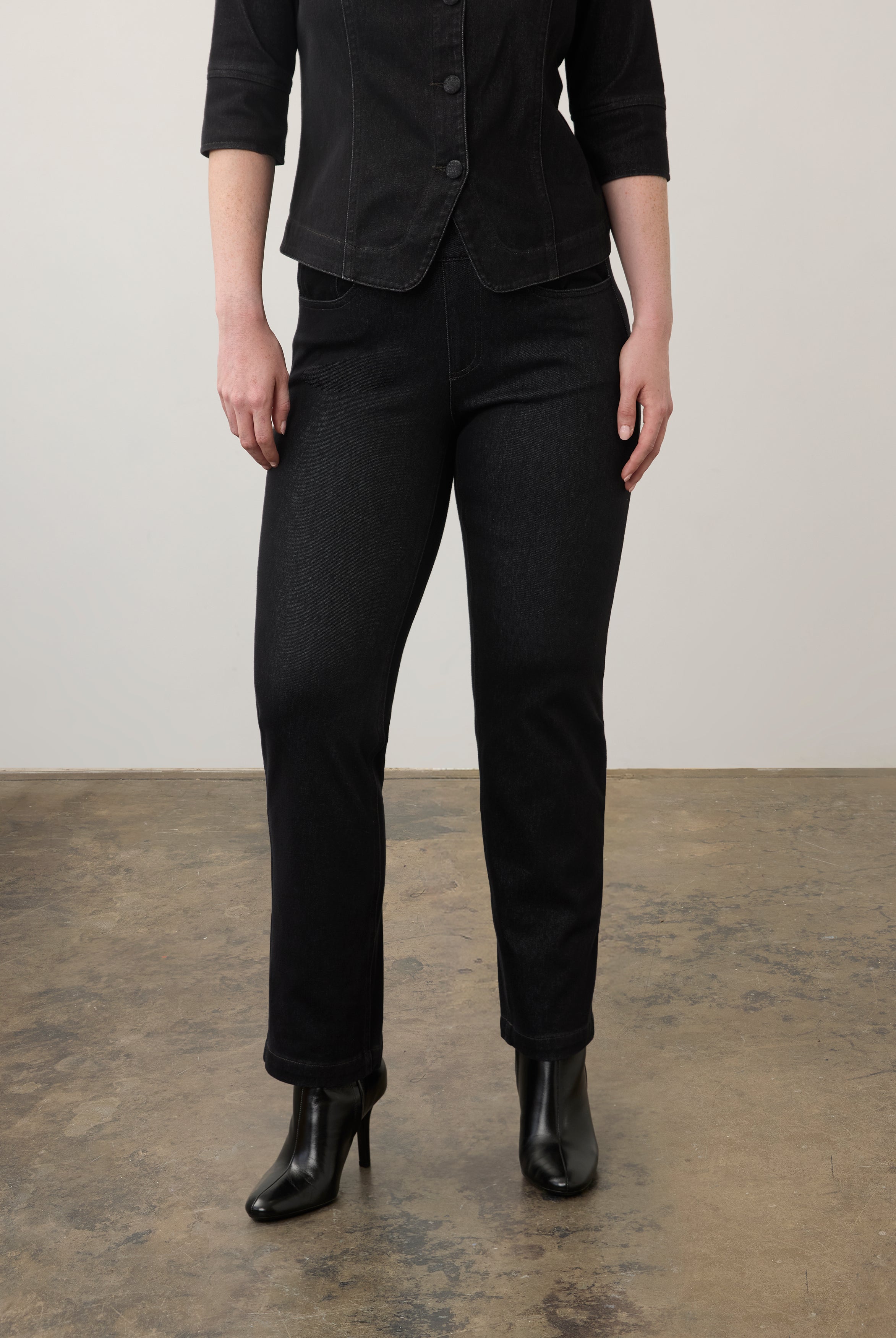 Black straight-leg jeans with front view showing classic fit and pocket design by French Dressing Jeans (FDJ)