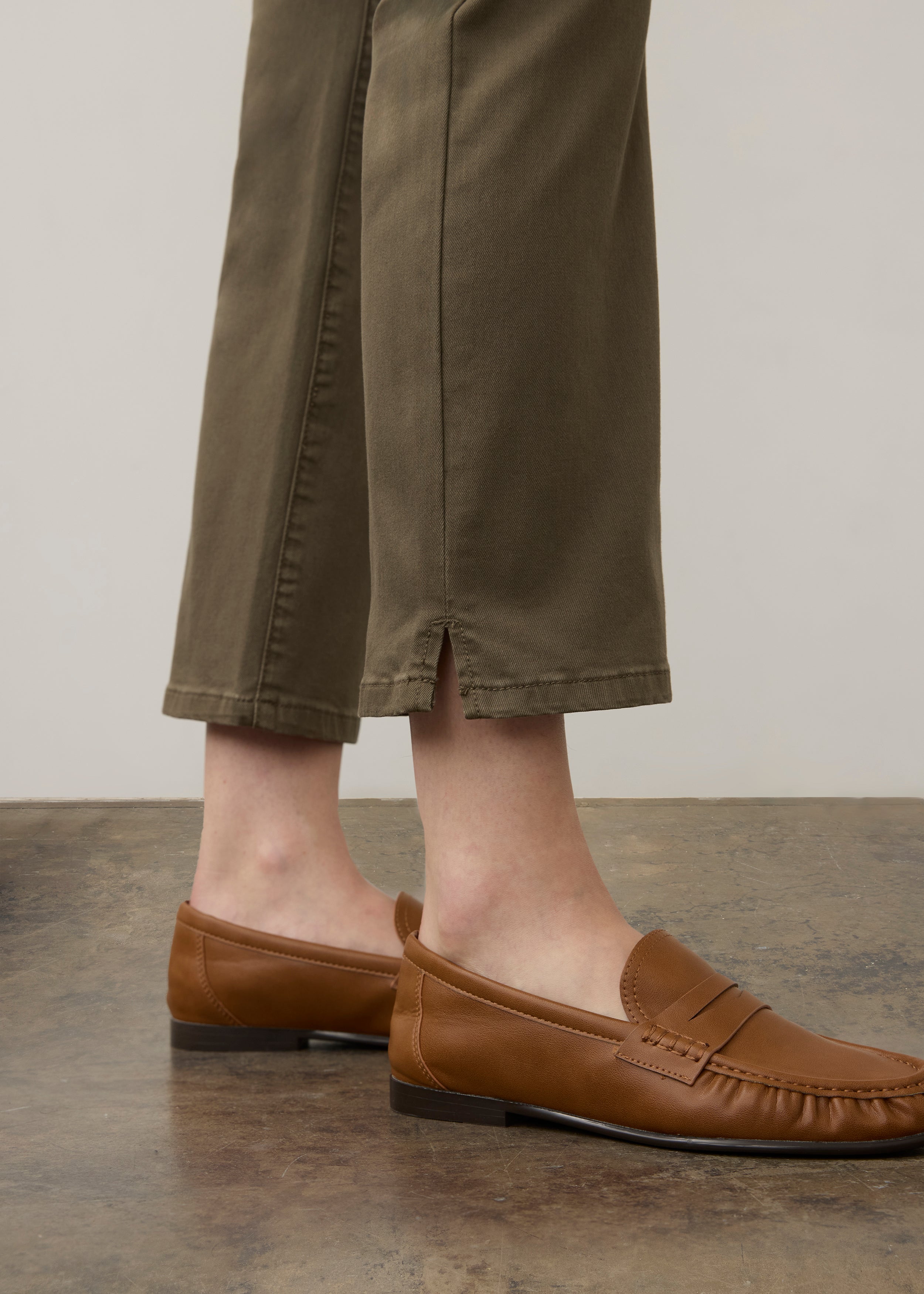 Detail shot of olive straight ankle denim leg slit by French Dressing Jeans (FDJ) par French Dressing Jeans (FDJ)