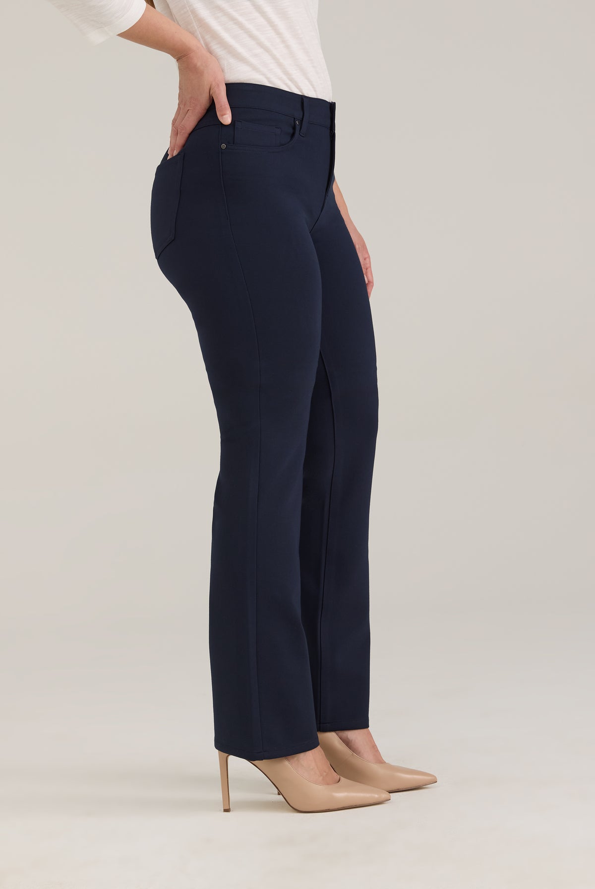Side profile of navy pants showing ankle length and fit by French Dressing Jeans (FDJ)