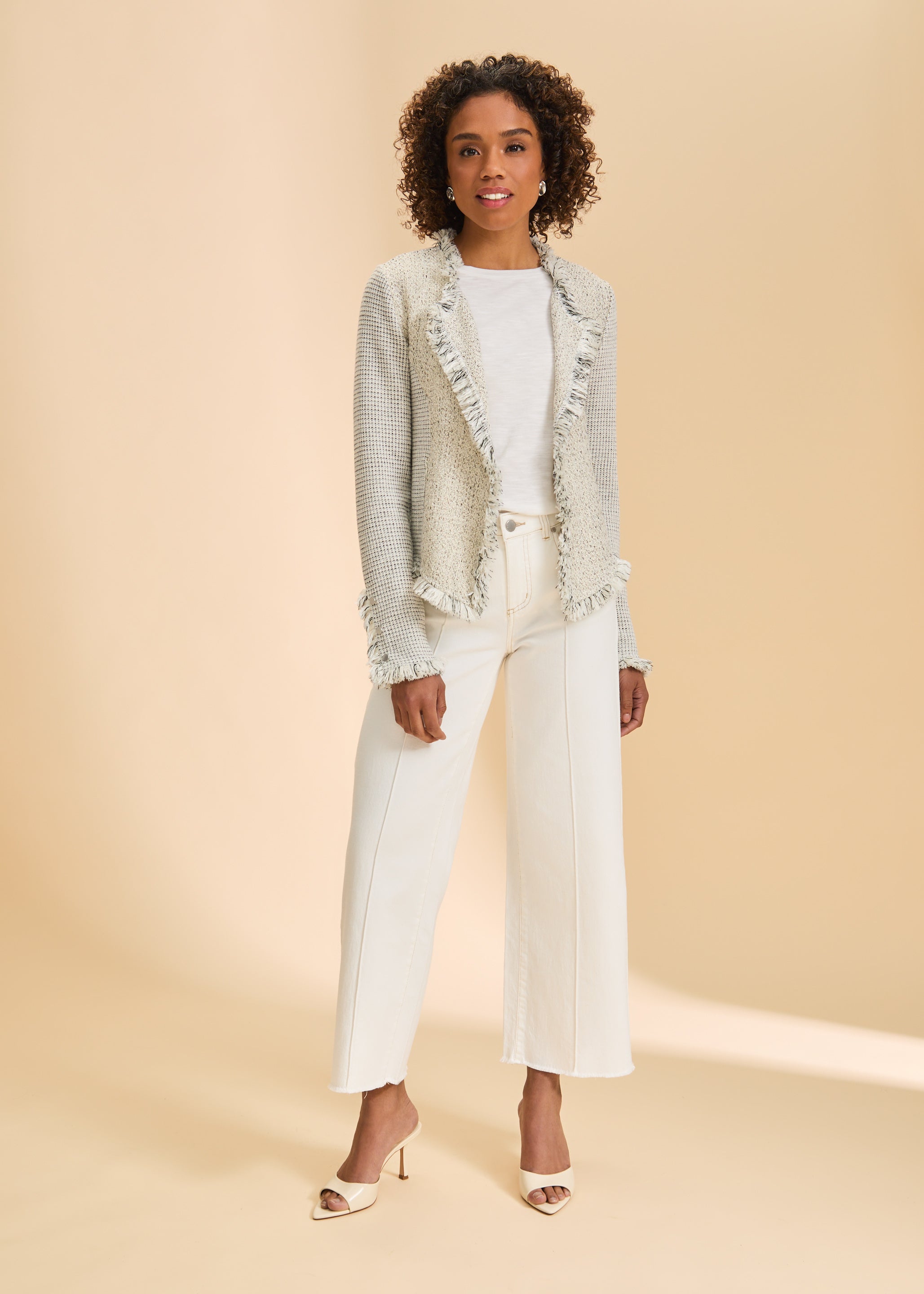 Full body view of cream tweed jacket styled with white pants and heels by French Dressing Jeans (FDJ)
