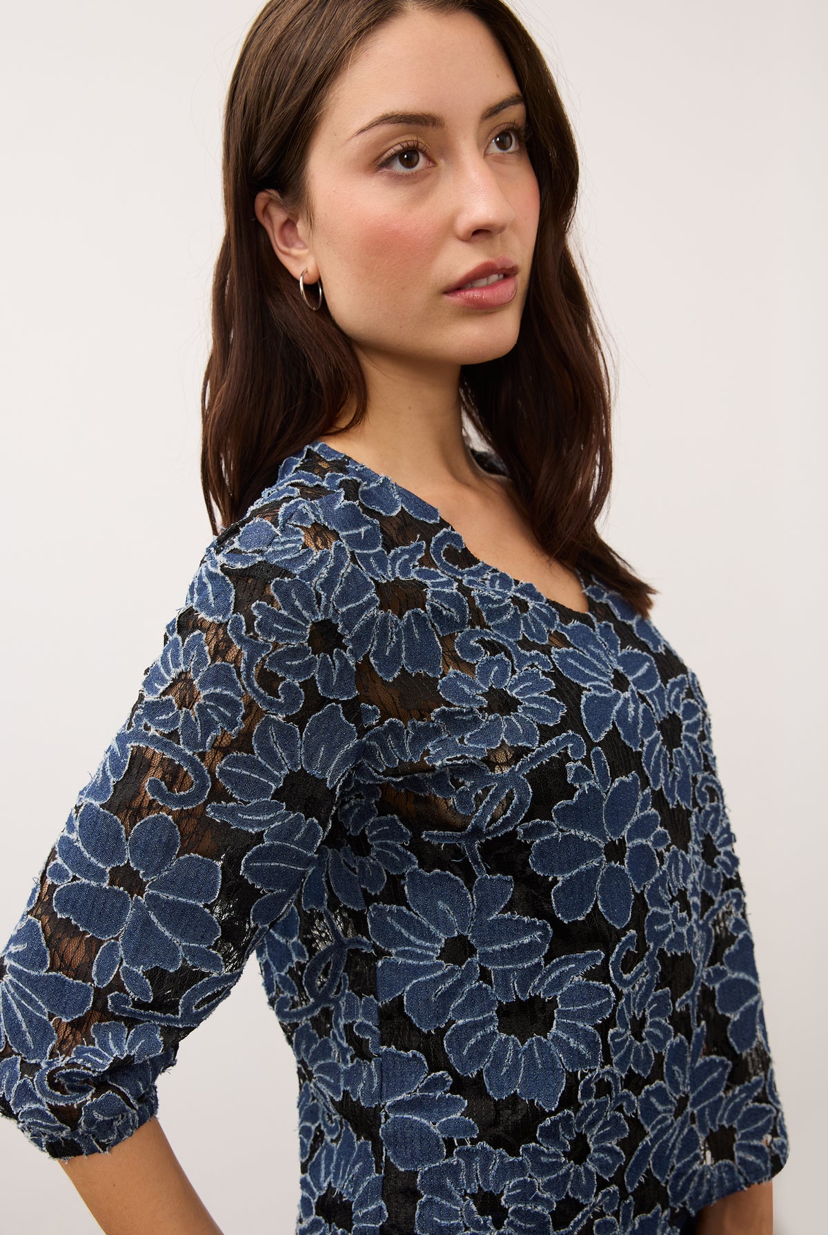 Side view of floral lace blouse highlighting texture and pattern by French Dressing Jeans (FDJ)