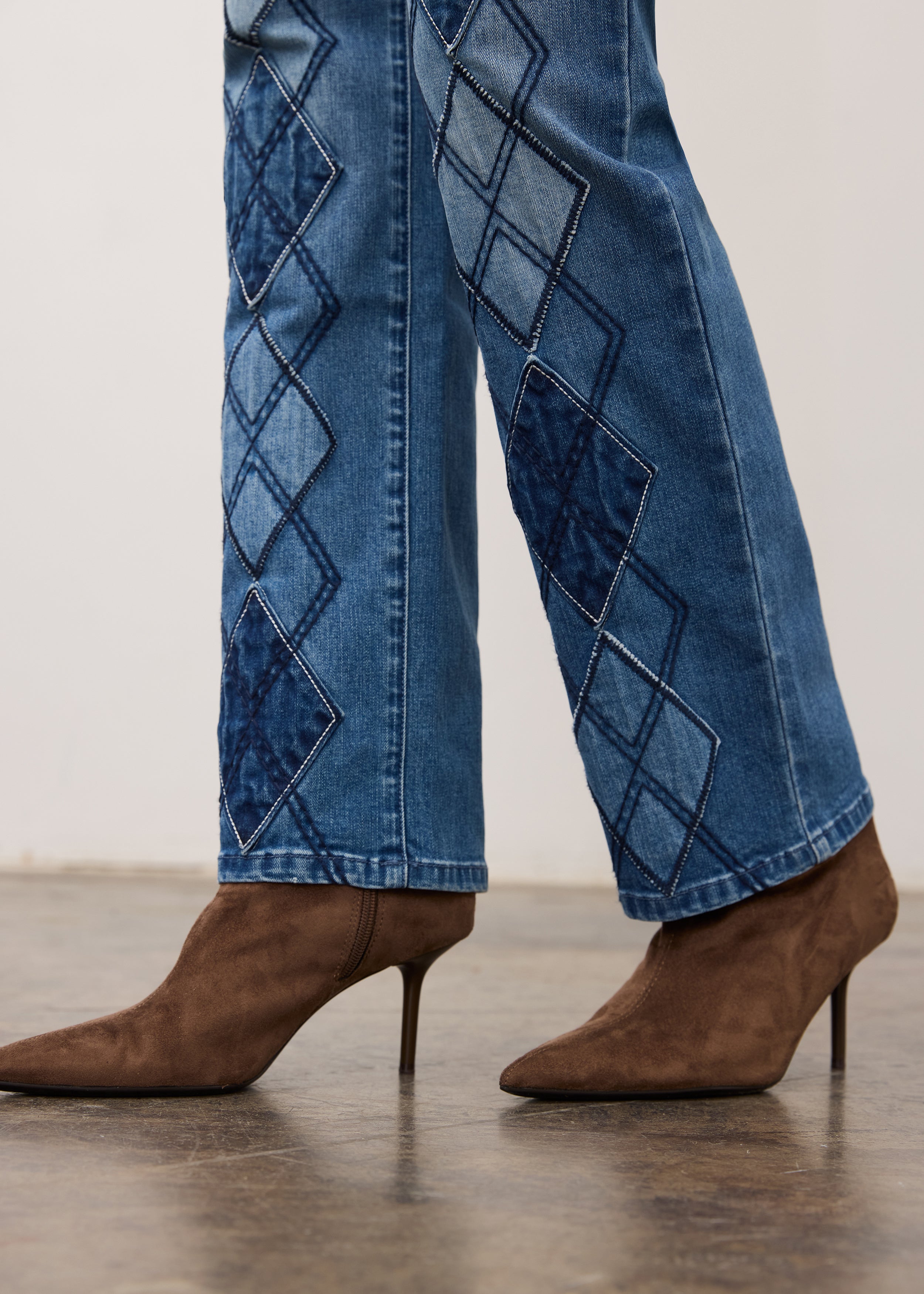 Close-up of indigo jeans fabric detailing diamond patterns on straight leg by French Dressing Jeans (FDJ)