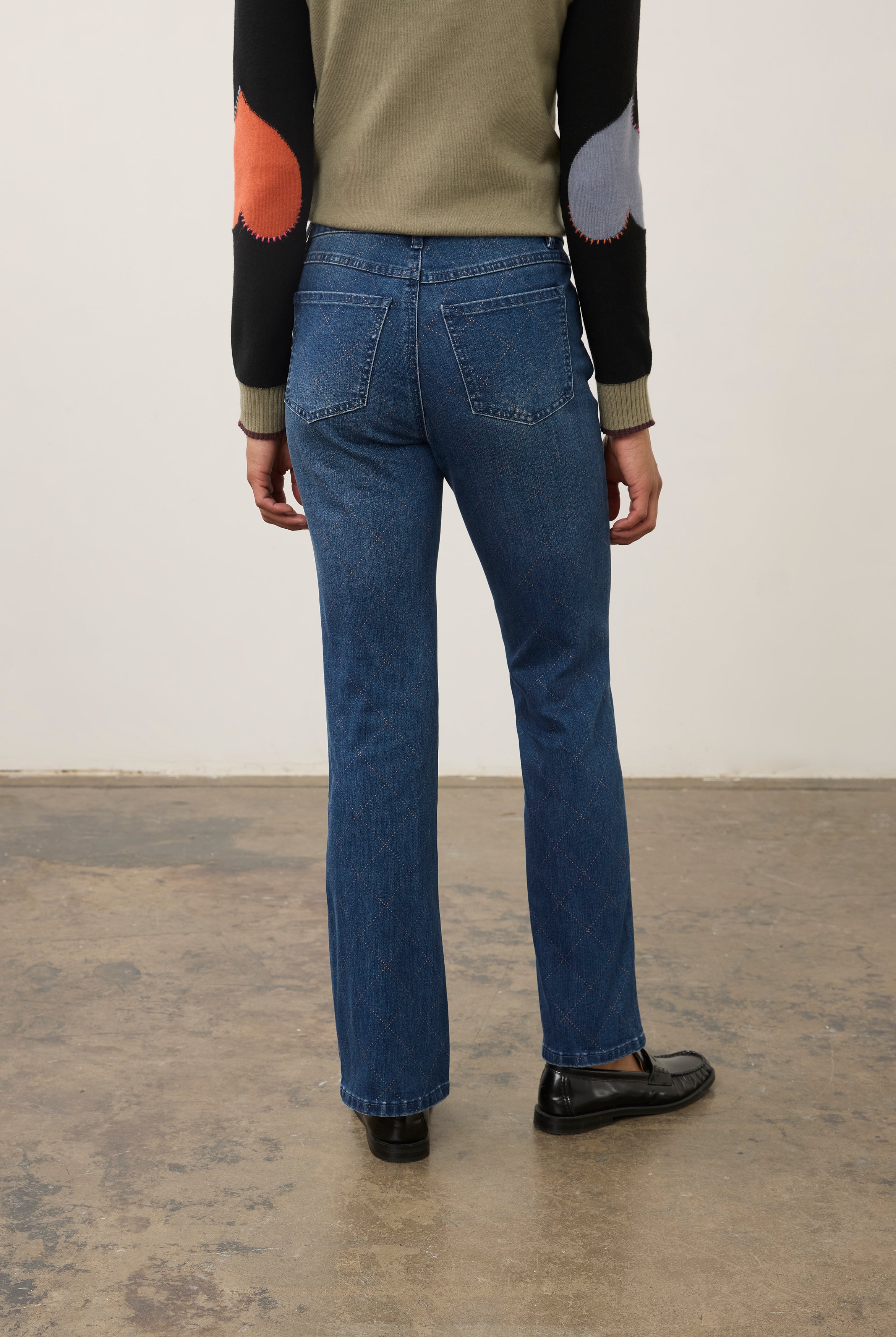 Back view of medium blue Olivia denim showcasing back patch pockets by French Dressing Jeans (FDJ)
