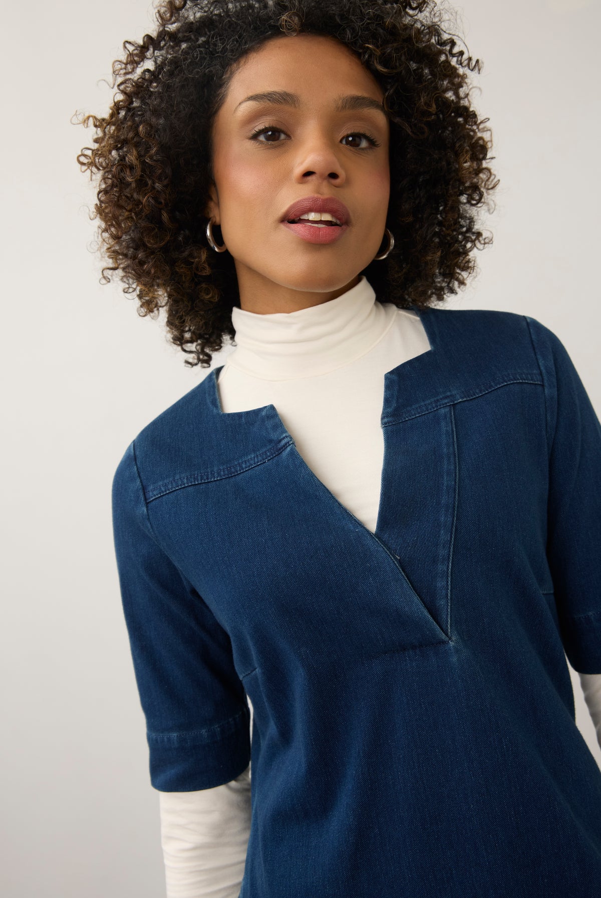 Detail of Elbow Sleeve Shift Dress in dark rinse focusing on neckline and stitching by French Dressing Jeans (FDJ)