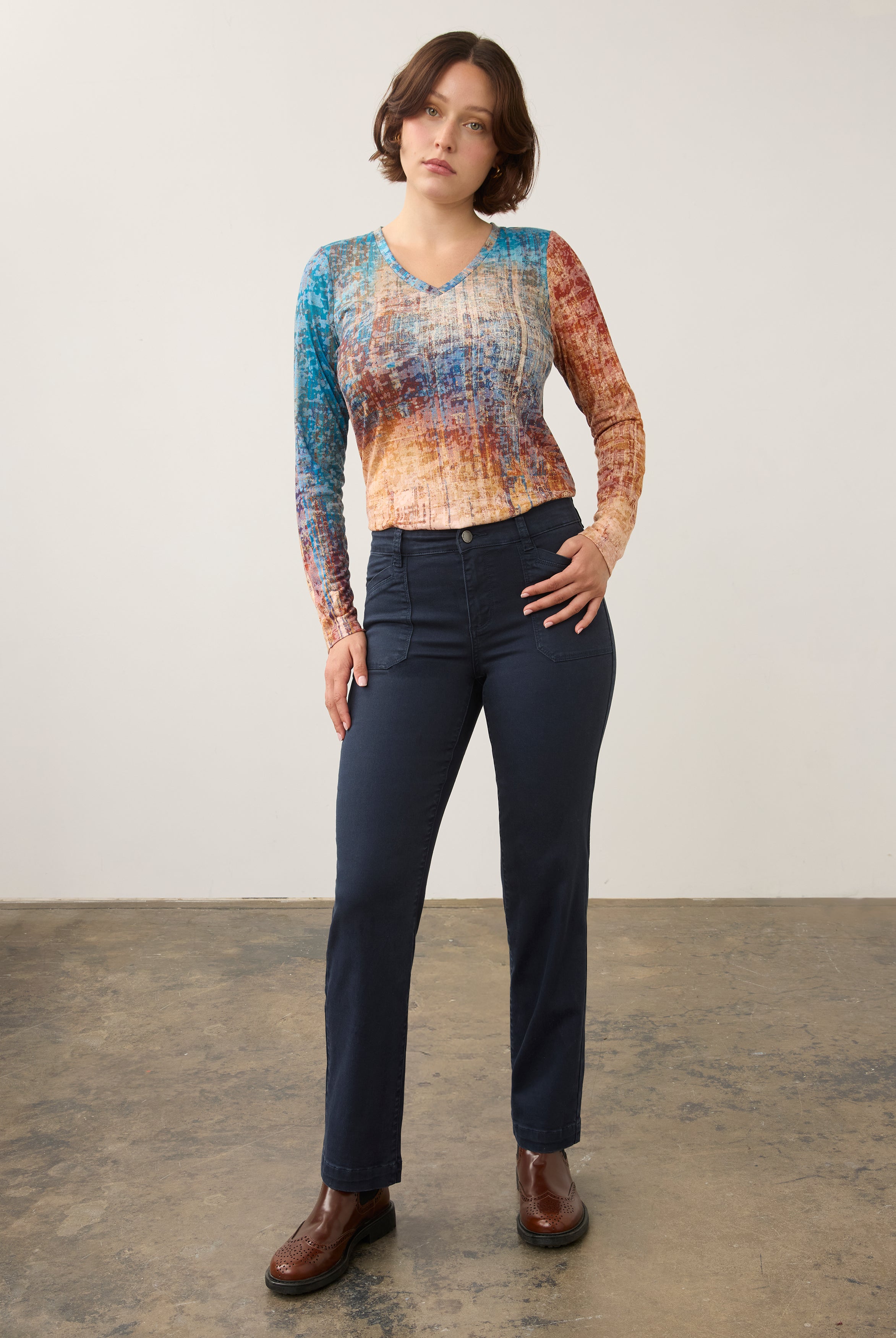 Full-body view of gradient long sleeve top paired with dark jeans by French Dressing Jeans (FDJ)