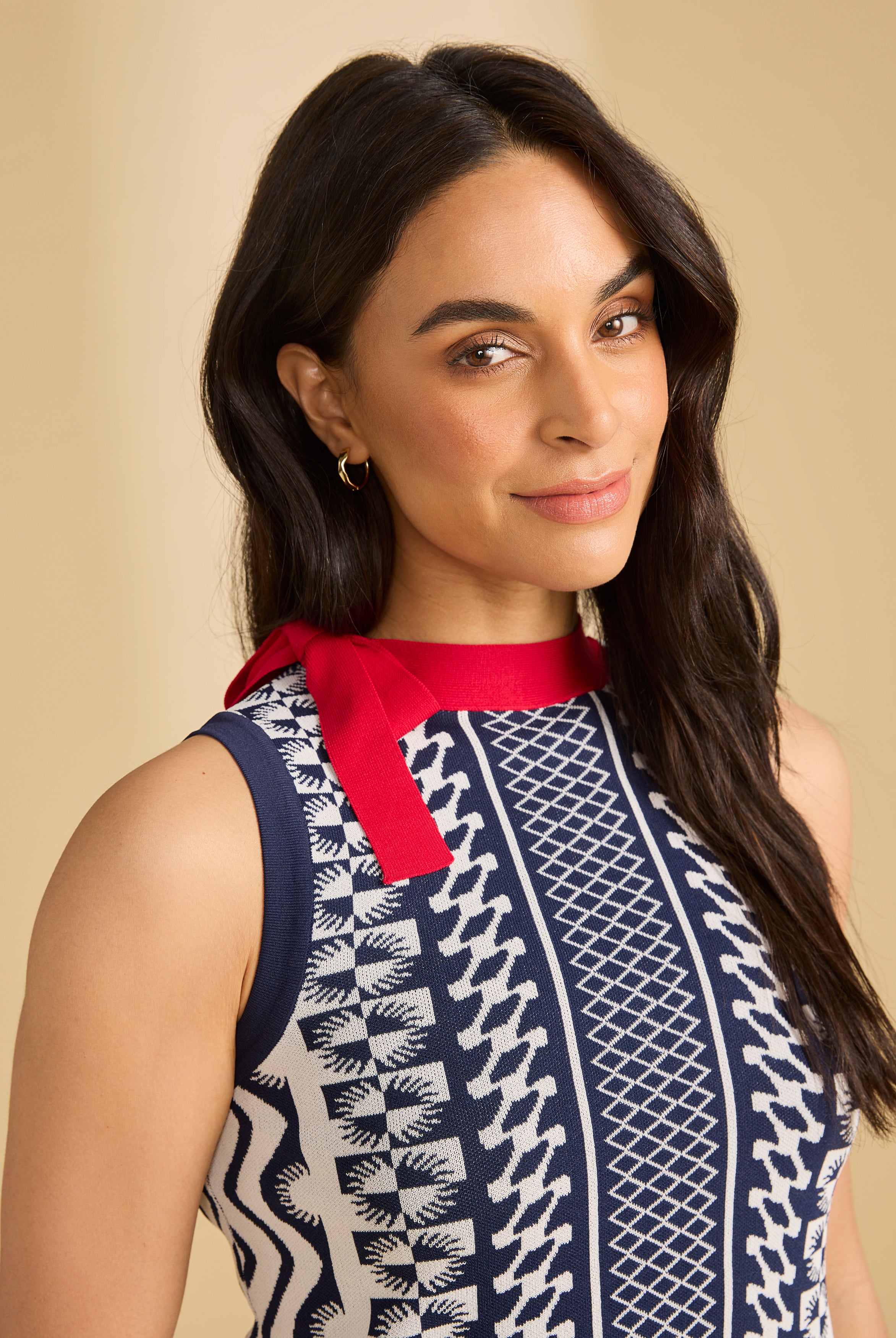 Close-up of navy patterned top with red bow detail by French Dressing Jeans (FDJ)