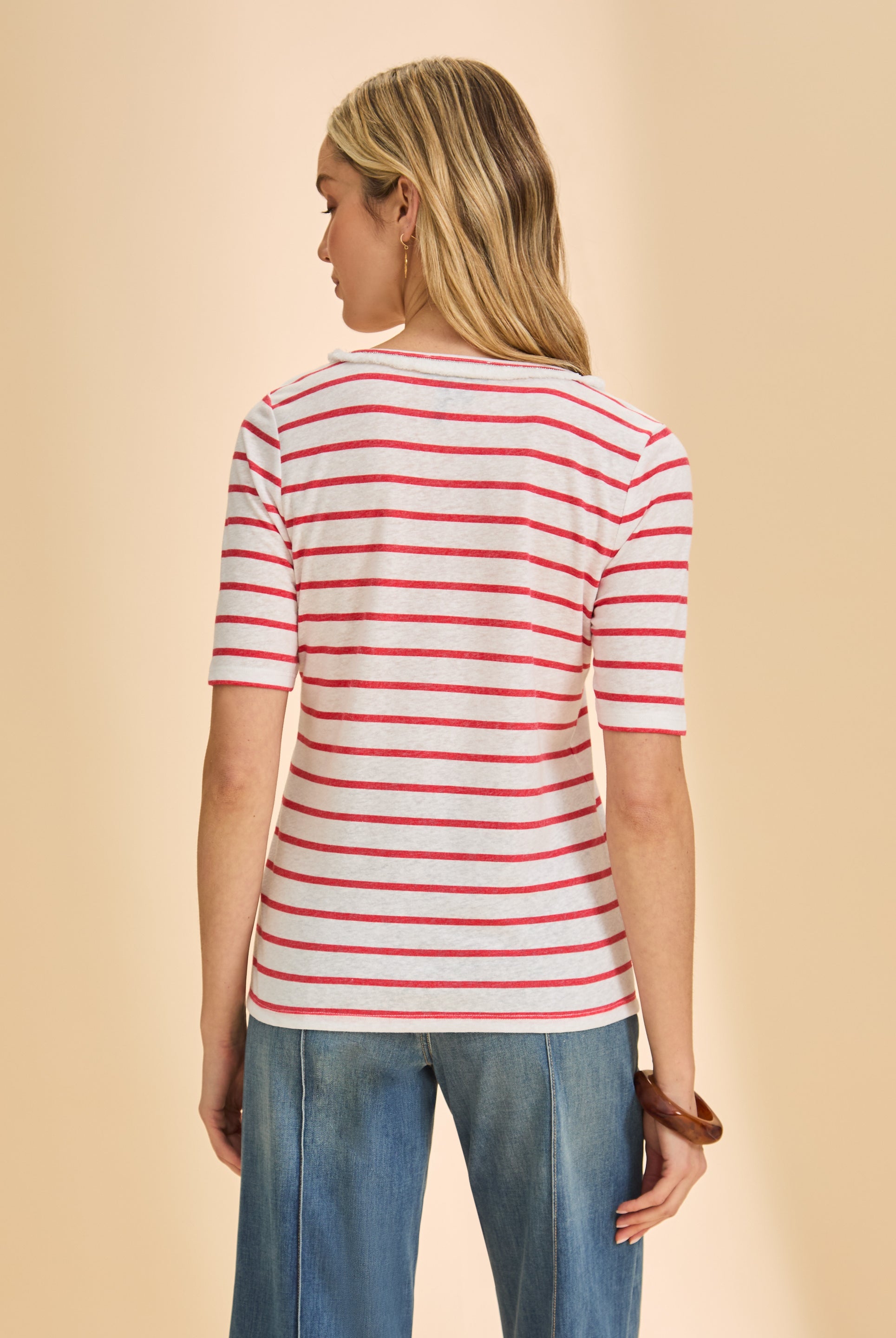 Back view of red striped V-neck top showing playful stripe pattern by French Dressing Jeans (FDJ)
