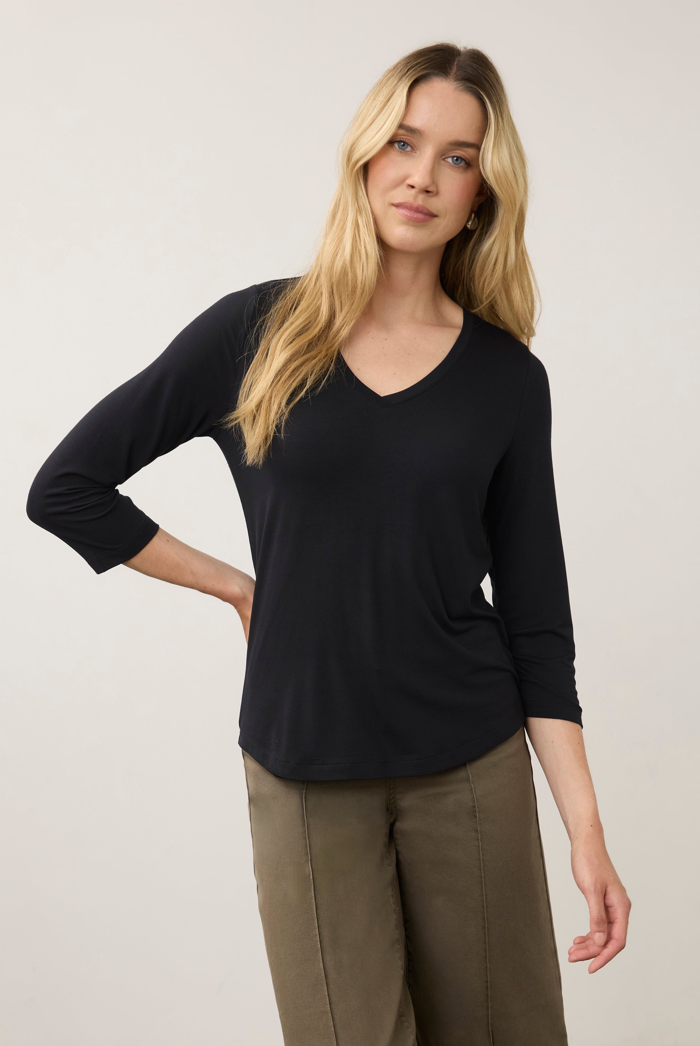 Front view of black 3/4 sleeve V-neck top with relaxed fit and soft fabric by French Dressing Jeans (FDJ)